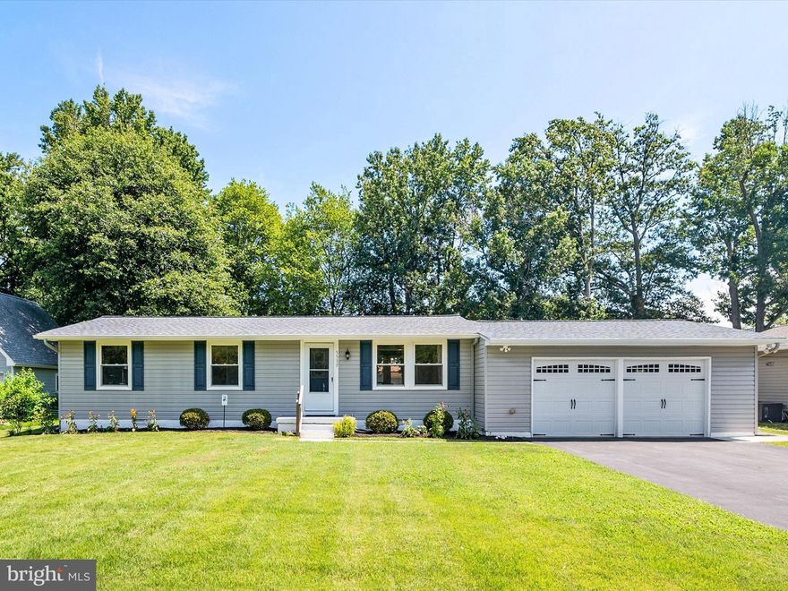 Charming Renovated Rambler with Water Views, 2-Car Garage & Double Lot!
 
Welcome to easy one-level living in this beautifully renovated Rambler-style home, perfectly situated in the sought-after water-oriented community of Franklin Manor. Nestled on a spacious double lot, this home offers privacy, comfort, and modern upgrades throughout. The kitchen boasts newer cabinets, a granite countertop, an island, stainless steel appliances, and a tiled backsplash. Newer laminate flooring and all-new carpet in the bedrooms. The baths have newer flooring, granite-top vanities, and newer tile surround. The roof was replaced in 2020 to include plywood.

Enjoy tranquil water views as you drive home, setting the tone for peaceful coastal living. A spacious 2-car attached garage adds convenience, while the expansive lot offers room to garden, play, or expand. Expanded driveway to accommodate your boat or RV.

Unwind in the screened-in porch, featuring a hot tub and wall-mounted TV—both of which convey with the property, making it the perfect year-round retreat for relaxation or entertaining. 

Whether you're looking for a permanent residence or a weekend escape, this home offers the best of low-maintenance living with a coastal vibe.