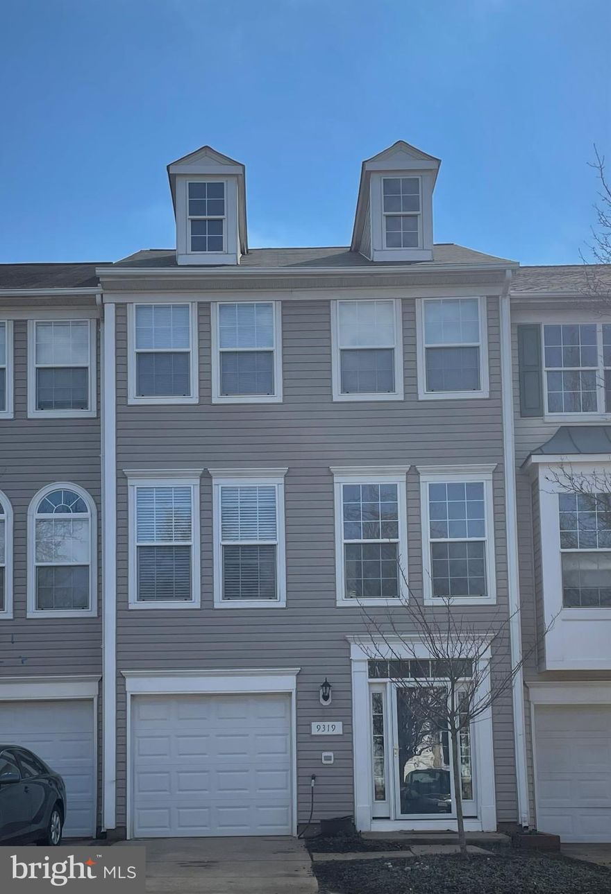 Conveniently located 4 bedroom garage townhouse in Manassas! Quickly move into this freshly updated town house. It is waiting for you! Beautiful hardwood floors in the oversized kitchen. The kitchen has so much room for a large table. Enjoy sitting at the kitchen island with  cup of coffee/tea. Or go out the sliding doors and sit on the deck! Upstairs are 3 large bedrooms and 2 full baths. The primary bedroom is exquisite This home also has a garage and driveway parking! A nice deck and fully fenced beautifully landscaped backyard provides the peace and quiet that you want! Lots of updates: 2021 New roof.  2020 new sliding glass door in the basement. 2019 interior painted.  2019 deck painted. 2018 new HVAC. 2018 new landscaping. 2017 new carpeting. 2016 new front door and new floor. 2015 new kitchen appliances and new countertops!