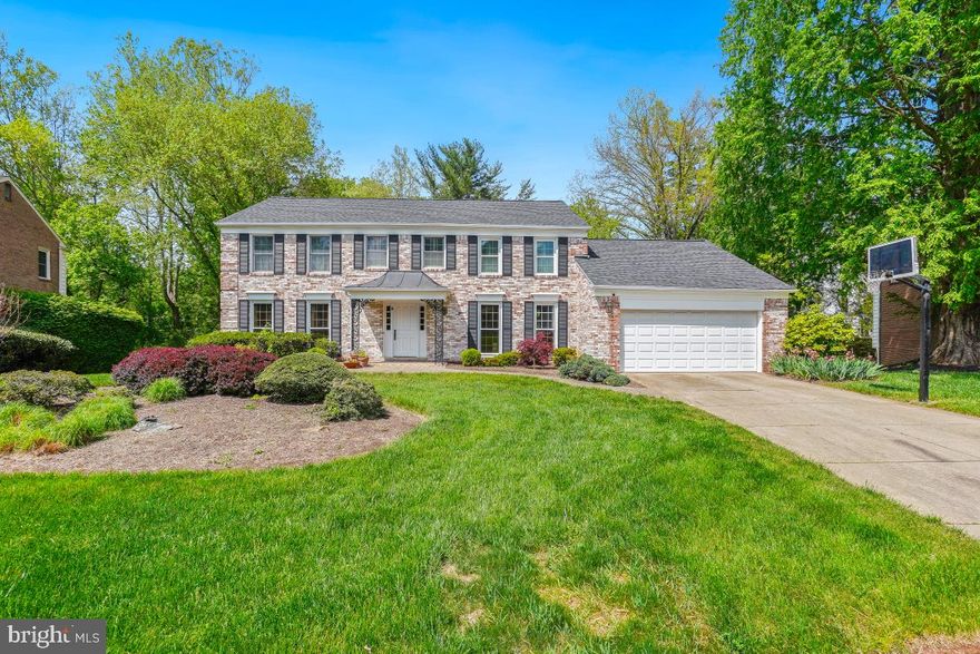 Welcome to this extraordinary brick home, perfectly situated in a coveted neighborhood and backing to serene parkland. A stunning three-story addition boasting high-end materials including Pella windows and a new roof transforms this residence into a spacious retreat ideal for luxurious living and entertaining.

Step into an immense family room featuring a soaring cathedral ceiling, a floor-to-ceiling stone fireplace, and an elegant bar area, flanked by double French doors that open to a generous deck—perfect for indoor-outdoor gatherings.The gourmet kitchen is a chef’s dream, boasting top quality appliances including Wood-Mode cabinets, Sub-Zero refrigerator and double wall ovens. An oversized island, additional peninsula, and a breakfast bar offer incredible counter space and seating options. The adjacent breakfast area, with floor-to-ceiling windows, three skylights and vaulted ceiling, invites in natural light and views of the lush backyard.A formal living room with floor-to-ceiling windows comfortably accommodates a baby grand piano and still leaves generous space for seating. A formal dining room and private first-floor office are on this level. Designed with entertaining in mind, both for intimate groups and large scale parties, this home features a layout where every room flows effortlessly into the next.

Upstairs, the primary suite is a true sanctuary, offering two walk-in closets and a luxuriously renovated spa bath with a soaking tub, glass-enclosed shower, and dual vanities. Three additional spacious bedrooms and a well-appointed hall bath with double sinks complete this level.

The walk-out lower level features two more bedrooms, two full baths, a large playroom, craft area, and two expansive storage rooms—perfect for flexible living and hobby space.Outside, the flat, verdant yard provides a tranquil setting for outdoor relaxation and play. The spacious deck is ideal for social gatherings or enjoying peaceful evenings overlooking nature.

Additional highlights include hardwood floors throughout, recessed lighting, and the timeless appeal of all-brick construction on all four sides.

This exceptional home blends space, quality, and style in a setting that offers both privacy and convenience. Don’t miss this rare opportunity to own one of the most impressive homes in the neighborhood.

This is a truly wonderful community. Exercise and play at the baseball fields, basketball courts, soccer fields, tennis courts and tot lots/playground. Enjoy the walk/jog paths to explore the pond and creek.

Convenient close-in location near schools, I-270 and all the shops and restaurants at Cabin John Village, Park Potomac and Potomac Village.
A listing not to be missed!!