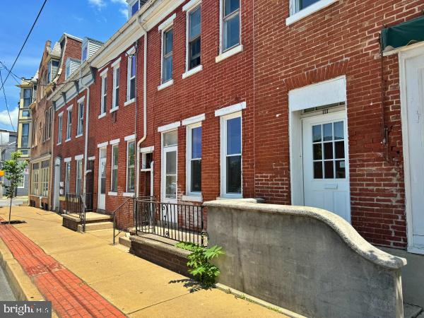 2nd floor - Studio apartment with 1 full bath and kitchen with stove and refrigerator. 1 off-street parking space included. No pets and no smoking indoors.