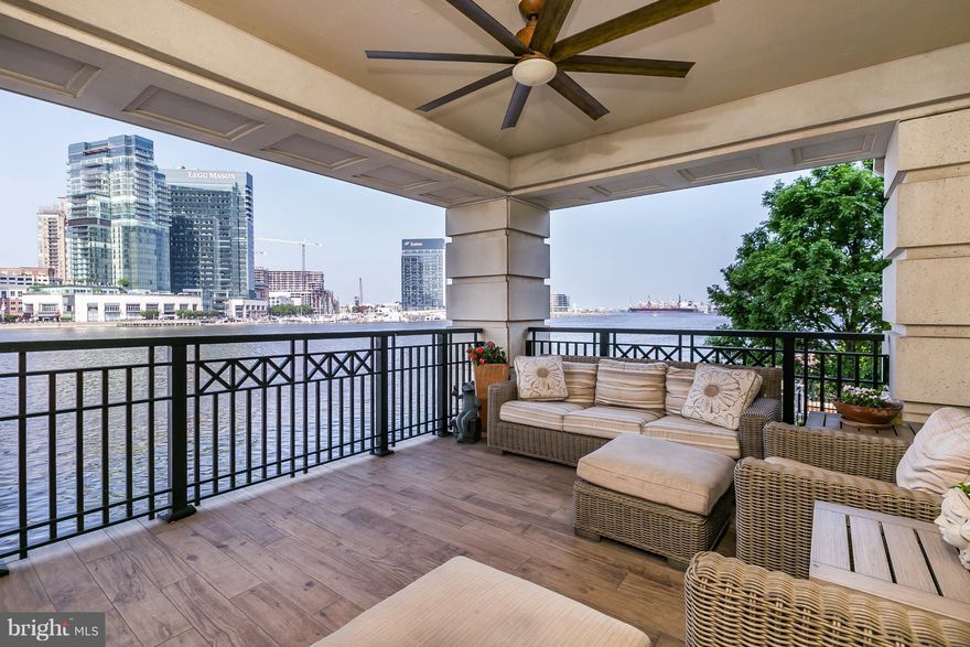Breathtaking garden & Inner Harbor views combine to make this designer unit your oasis in the City! As featured in The Baltimore Sun Dream Homes, this former model boasts impressive upgrades thru-out. Sun-filled, beautifully appointed w/ gracious rm sizes, this home is sophisticated, comfortable & offers gorgeous vistas from every room. Enjoy relaxing on the spacious terrace morning, noon & night!