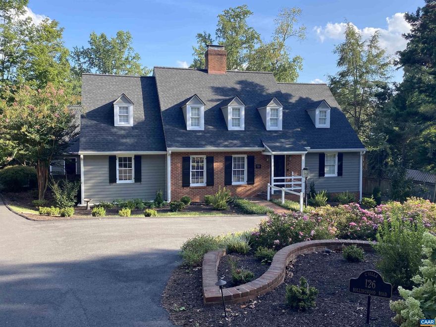 Set on a generous one-third?acre lot in the heart of the University of Virginia, this recently renovated and substantially improved Cape Cod home is truly move-in ready. Enjoy an easy walk to the Rotunda and UVA?s stadiums, or take advantage of miles of nearby trails for hiking, biking, and running. The welcoming living room features a gas fireplace, rich paneling, and custom built-in bookcases, while the charming dining room easily accommodates large gatherings. The inviting kitchen, appointed with Carrara marble countertops and wood floors, opens to a light-filled family room with a wood-burning fireplace, wine and coffee bar, and abundant natural light throughout the day. The main-level primary suite offers a walk-in closet plus an office or second walk-in closet. The spa-like primary bathroom includes a spacious tiled shower, soaking tub, heated floors, and dual vanities. Upstairs are two ensuite bedrooms that share a bath, a fourth bedroom, and a third full bathroom. A separate staircase leads to a versatile second-level recreation room, office, playroom, or studio. Additional features include an oversized two-car garage with an extra bay for outdoor equipment. Outdoors, enjoy the expansive deck, fire pit and fenced yard.,Marble Counter,Wood Cabinets,Fireplace in Family Room,Fireplace in Living Room