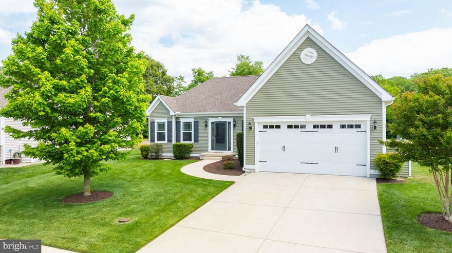 COMFORT MEETS CONVENIENCE.  1,597 square feet of thoughtfully designed space, perfect for relaxed coastal living.  Nestled just a stone’s throw from the community pool, clubhouse & bocce ball, and within walking distance to local favorites like Dewey Beer Company and Pizza Machine, you’ll enjoy both community charm and small-town vibrance right at your doorstep.  Step inside to discover a light-filled layout that flows seamlessly from the main living area to a spacious kitchen, ideal for everyday living or entertaining guests. The unfinished walkout basement presents an exciting opportunity for future customization - whether you're envisioning a cozy rec room, home gym, or additional bedroom & bathroom, the possibilities are endless.  Offering the best of both serenity and accessibility, don’t miss your chance to own this ideally located gem in one of Milton’s most desirable neighborhoods!