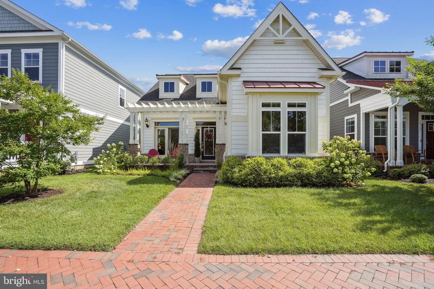 This beautiful 3 bedroom/3 bath home is located in one of Talbot County’s most desirable communities - Easton Village on the Tred Avon River!

The attractive brick porch of the “Bridgeport” style home welcomes you in and provides a lovely spot to enjoy the scenic vista of the community.  Inside, admire an open floor plan with an abundance of natural light, offering two main-level bedrooms, including the primary suite. The primary suite features a large walk-in closet and custom ensuite bathroom. The upgraded kitchen, located centrally, opens to the great room and breakfast nook and boasts a large island, quartz countertops, and stainless-steel appliances. From the breakfast nook, enjoy a convenient segue to the rear screened porch – perfect for enjoying an evening libation at the end of a long day! Completing the first level are a separate formal dining room and family room. The second level has a spacious bonus room (currently being used as a den/game room) and a third bedroom and full bath. An attached 2-car garage is at the rear of house with alley access and off-street parking.  

This water-privileged community on the Tred Avon River provides the utmost in amenities: waterfront access and a community pier, a clubhouse with fitness room and waterside pool, ponds and park spaces including Vicker’s Park, a bocce ball court, kayak launch, kayak racks, walking nature trails, and acres of preserved wetlands. HOA fees for this property include grass-cutting for the front, side and rear; snow removal; common area maintenance; use of the clubhouse and pool and common areas. Minutes to downtown Easton and Saint Michaels where you will find a plethora of seafood houses, quaint eateries and cafes, art galleries, boutique shopping and so much more!