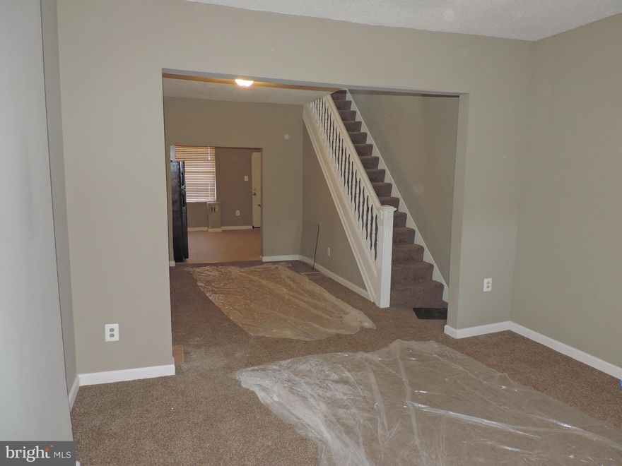 Come See Today! Main level features a kitchen, living room, and Dining Room. Upstairs features 3 bedrooms, and  a full bath, home has new carpet through out the home! Great opportunity for only 80k. Call to schedule a showing today