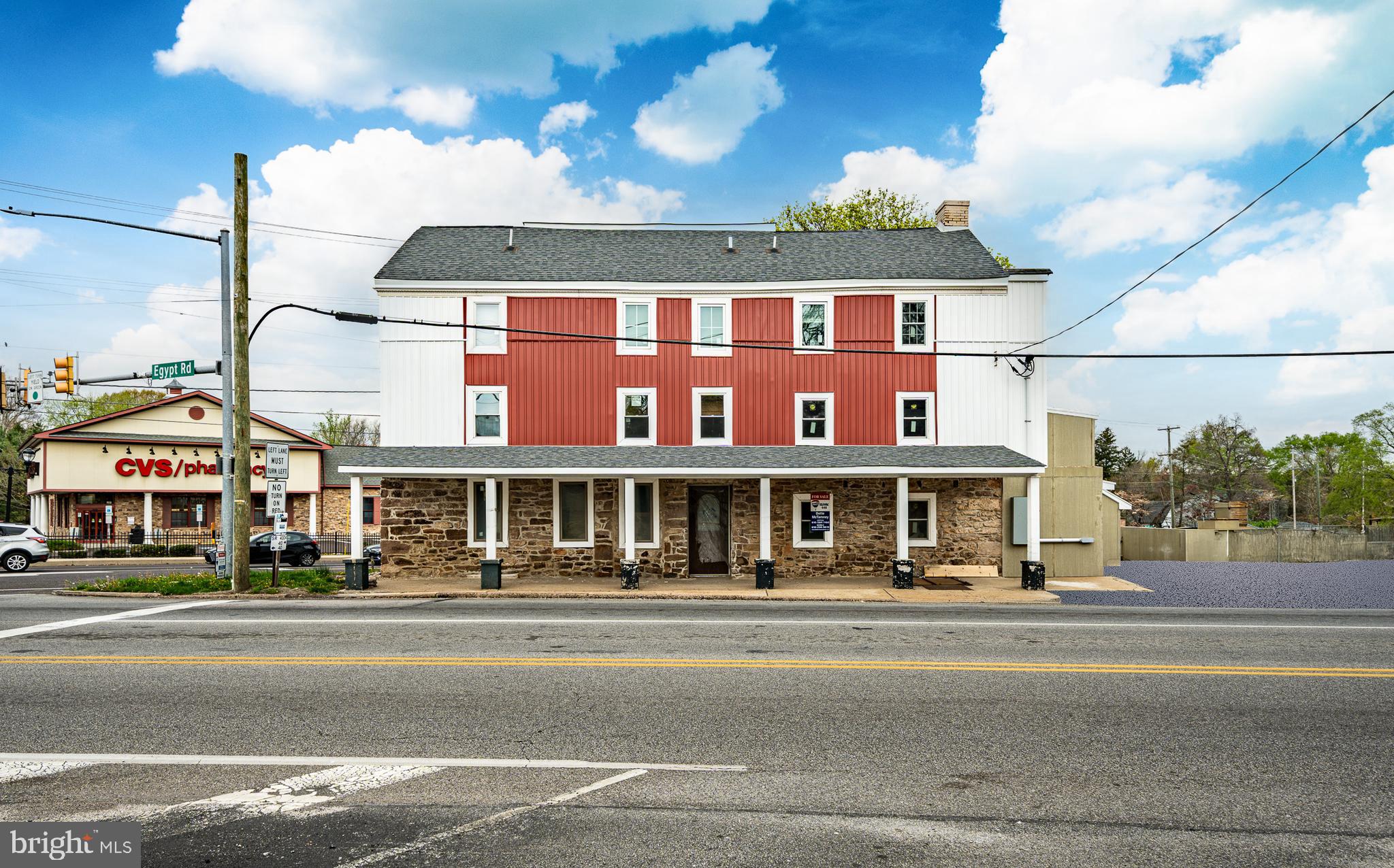 Opportunity to relocate your business and own this well known, high profile corner in Audubon, Lower Providence. Renovations are in progress at the old Bud’s Bar and Restaurant. Check out the changes on this first floor commercial space now with a 2 story main floor renovation happening and the additional rear area completely opened up and ready to finish. There is also an outside rear fenced paver patio area and a newly redone basement for full use. Consider the uses for this 1st floor commercial space and 4 high end upscale residential apartments on the 2nd and 3rd floors. The income possibilities are here to own and have your business on the 1st floor, perhaps with two separate retail spaces. Then, collect the rent for these 1 and 2 bedroom renovated upper level floors with decks and private entrances. There is one large bilevel 2 bedroom, 2 bath unit with a roof deck, two, 1 bedroom, 1 bath units with balconies and a large one unit studio with a roof deck and cathedral ceilings. Brand new stainless steel appliances, bathrooms, vinyl plank flooring, lighting and all have their own separate meters and utilities. Business considerations would accommodate with full approval, Day Care, Professional, Medical, Restaurant/Bar (need liquor license), Food and Beverage, Hair Salon and Spa, Mixed office space and Apartment rentals. A possible retail drive in capability here with access from 2 major roads. Parking for over 40+ vehicles, on a 40,456 foot lot and is zoned Village Commercial. The first floor offers an estimate of over 3000+ sq ft of a total building space of 6600. This property is ready for final development, offering multiple choices for use and opportunity. The income possibilities are here to own and have your business on the 1st floor, perhaps with two separate retail spaces, rent the 2nd floor apartments, or lease the whole building. This has an excellent location at the corner of Park Ave. and Egypt Road, with quick access to 422 to the east and west, and minutes to 202 north and south, along with the Pennsylvania turnpike. Traffic count is estimated at over 20,000 vehicles per day. The actual location is in Audubon, Lower Providence in Montgomery county and is serviced by public water and sewer. The other corners are occupied by CVS Pharmacy, Village shopping center, a Historic stone building with an attorneys office. Across the street Redners food market and Audubon shopping center with liquor store, beer store, UPS, nail salons, upscale coffee shop, Dollar Tree and many other shops. It is also just minutes from Oaks shopping center with Lowes, Target, BJ’s Wholesale, and several other stores and hotels. Call for your own private tour and let the excitement of your new adventure begin. The Commercial space on the first floor has roughly 3000 sqft of space also for Rent at $6000 per month. 4 residential units also for rent from $1800 per month.