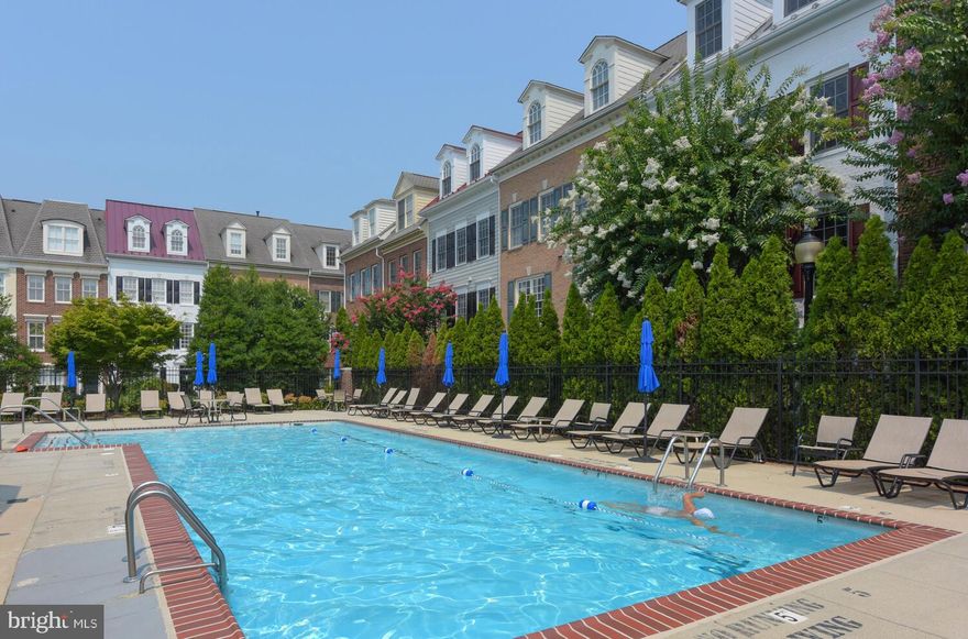 Old Town Alexandria, quiet cul-de-sac,  two bedrooms, two and a  half baths,  9-foot ceilings, crown molding, wainscoting, separate dining room, hardwood in the kitchen and foyer, 42 inch cabinets, breakfast bar; 3-sided fireplace; brand new HVAC system (April 2019).  Large balcony,  pool, 4 blocks to King Street Metro.  Neutral carpet and paint; walk-in closet; 2 blocks to King Street Shops and Restaurants;  Whole Foods one block; Pool; Gym