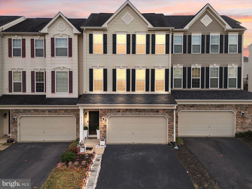 Please visit this link for ALL the details: https://listings.carmichaelphotovideo.com/41919-Moreland-Mine-Terrace-Aldie-VA-20105-USA?mls
Beautifully maintained two-car garage townhome located in the highly sought-after Stone Ridge community of Aldie. This spacious home offers over 2,600 sq. ft. of living space with hardwood floors on the main level and carpeted bedrooms for added comfort. A generously sized powder room adds convenience on the main level.
The open-concept main level features a gourmet kitchen with granite countertops, stainless steel appliances, a brand-new refrigerator (2026), Dishwasher (2026), Microwave (2025), Oven (2025) and Stove (2025) and a kitchen island  seamlessly flowing into a huge family room with a gas fireplace, perfect for entertaining. 
Enjoy abundant natural light throughout and step outside to a Trex deck overlooking a fenced, paved, low-maintenance backyard. The home is pre-wired for EV charging and offers exceptional parking, with space for up to four cars—two in the garage and two on the driveway, plus plenty of community parking.
Residents enjoy access to community amenities including a pool and clubhouse. Conveniently located close to shopping centers, Gum Springs Library, and Stone Ridge Hospital, this home combines space, comfort, and an unbeatable location.