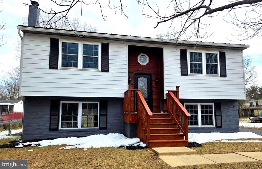 This Split Level home is a Great Starter or Retiree home.  Close to everything Elkton has to offer, just off Rt 40.  Home has been completely remodeled with LVP Flooring, New Paint,  2 bedrooms upstairs, Kitchen, breakfast nook, living Room and full Bath with Alexa controlled  lights and music. Floored Attic with Electric.   Downstairs has a Family room with Custom Cabinetry, a Bedroom , Full Bath and Laundry room. Lower level has walk out with sliding glass doors to the fenced backyard and covered car port.  14X20 2 Story Shed/workshop. The following upgrades have been completed since "2024", New Metal Roof, New Gutter System, New windows through out,  All New flooring inside, New hot water heater, This home is a must see,