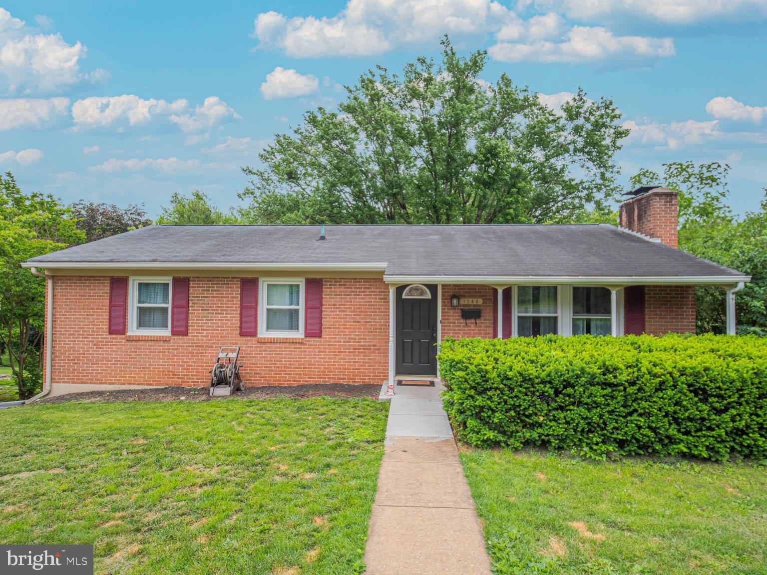 OPEN HOUSE SATURDAY 6/26 12-2pm Welcome home to 1044 Valleybrook Dr! This charming all brick rancher is located in Potomac Manor features 3 bedrooms and 2 bathrooms and was recently renovated in 2019. The main level features an updated kitchen with stainless steel appliances, new flooring throughout, new lighting fixtures, and a charming brick - wood burning fireplace. The lower level features a bonus family/recreational room, ample amount of storage space, washer/dryer hookup, a connected oversized two car garage that walks out to the large back yard. Enjoy the spacious backyard that is nestled along a small stream. Portion of the property, NOT THE HOME is located in 100 yr flood zone. Insurance a little over $1000/year through Floodsmart insurance.