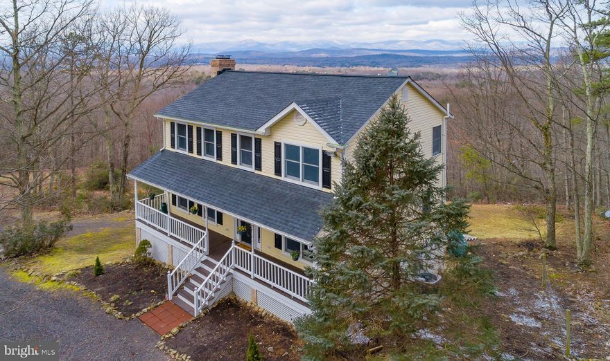 MUST DEAL DIRECTLY WITH OWNER FOR INFORMATION & ACCESS. MICHELLE DIRIENZO-540-937-3240-HOME OR CELL: 813-751-4209.  EMAIL mldsmrbayern@gmail.com. The best of Both Worlds! Breathtaking Blue Ridge Mountain 180 degree views from this beautifully renovated 10+ acre home with 2360 sf living space, 2 car detached garage, and total peace & tranquility with all of today's modern conveniences! Home includes all new cabinetry and granite counter-tops in Kitchen & Baths (Kitchen cabinets are soft close). Kitchen also includes new stainless steel appliances, subway tile back splash and eat-up bar. Breakfast Nook off Kitchen, with French Doors to deck overlooking mountains. Cozy wood-burning fireplace on main level, with full dining room, half bath, and gorgeous hardwood floors, all new light fixtures, and beautiful double-hung Andersen windows throughout the home. Master bedroom includes wood beams in ceiling, hardwood flooring, a spacious closet, and barn doors leading to a luxurious master bath with separate soaking tub, and alluring tiled shower. Additional rooms include new carpeting, and spacious closets with lighting. Basement includes bonus room for office, exercise, storage, or additional bedroom, as well full bathroom, new LG Sensor Washer/Dryer, Butlers Pantry, wood-burning stove, and French Doors to spacious patio with porch swing. This incredible home also includes new toilets & bathroom hardware in all bathrooms, new Roof and Seamless Gutters, new Septic Tank & Drain Field, new Heat Pump and Hot Water Heater. Tremendous value in this home where the sun rises in the front, sets in the back, and the sunsets are incredible. Home has recently been appraised by certified appraiser Truly a must see!