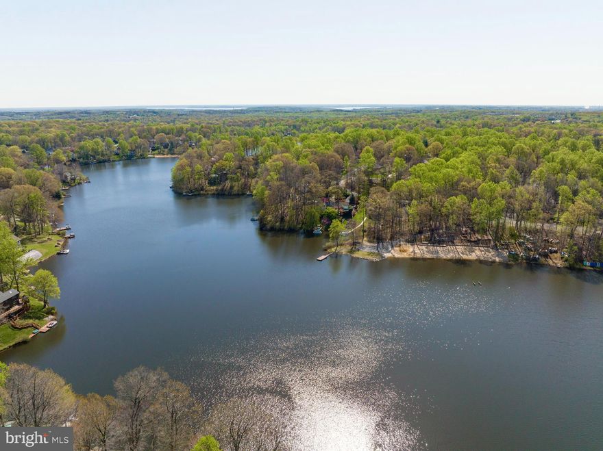 Must-See Waterfront Townhouse with gorgeous views situated directly on Lake Montclair!  BONUS, This listing now qualifies for special financing through Project My Home for qualified buyers with interest rates as low as 4.99%!  Contact listing agent for details.  Discover this beautifully-updated 4 Bed/3.5 Bath townhome in the amenity-rich community of Southlake at Montclair.  Stunning, year-round views of the lake, ideally located on the south end of Montclair where Grocery/Restaurant/Retail, commuter bus stop, Pool and Rec Center, Library and more are just a couple blocks away.  This home features three spacious bedrooms on the upper level, and a 4th flex space/legal bedroom on the walk-out lower level.  The main floor is flooded with natural light, attractive laminate flooring, a gas fireplace, and access to the upper deck overlooking the lake  The updated kitchen has new marble-look pergo flooring, gorgeous granite counters, stainless steel appliances and a large bay window perfect for a cafe table.  The primary suite features a vaulted  ceiling, an updated attached full bath with large walk-in shower, and a walk-in closet.  The  two other bedrooms on this level share an updated hall bath. The bright, walk-out lower level features a 4th bedroom that can also flex as a Rec Room area.  The full bath has a tub/shower combo.  There is an additional space on this level that is perfect for a home office, gym or whatever your heart desires.    New Roof 2019, New TRANE HVAC system 2022; New Hot Water Heater 2019.   by Freon Doctor, roof replaced 2/26/2020. Enjoy all the incredible amenities Montclair has to offer including  a 109-acre stocked lake with 3 sandy beaches, boat ramp, boat storage, fishing piers, playgrounds/tot lots, ball fields, exercise stations, new dog park, 18-hole golf course with full-service Country Club, ...the list goes on! This property is also located in Southlake Rec which provides pool membership and added recreation amenities. Easy access to I-95 and nearby commuter lots/buses make it easy to commute to DC, the Pentagon, and beyond. WEGMANS and Stone Bridge Shopping Center are just 10 minutes away.  Home is currently enrolled in a premium home warranty with the option to transfer to buyer at closing.