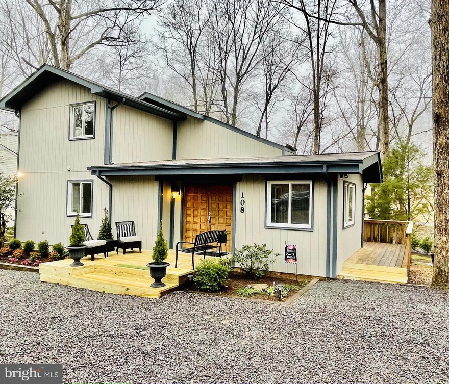 Welcome to 108 Cumberland Circle! This meticulously renovated, turn-key waterfront home (almost everything is new in 2021!) is perfectly nestled among the trees on Keaton Lake, while also offering fabulous golf course views. So grab your fishing pole, kayak, or camera, and let's get this lake life started! You'll fall in love as soon as you turn onto the tree-lined driveway providing privacy from the road. The landscaping, inviting front porch, walking paths to the lake, screened porch, decks, and the abundance of privacy will make this one "the one" prior to even stepping inside...but wait until you do! Once you enter through the solid oak door, the elegant foyer and incredibly spacious living room which flows so easily into the dining area will impress. Your gourmet kitchen is equipped with stainless steel appliances, an island and granite counter tops.  A main level owner's suite with en-suite bath will be sure to please, as well as another bedroom (or office, which will make working from home a breeze). The upper level boasts two additional bedrooms and a stunning full bath. Imagine sitting on the screened porch and listening to nature serenade you.  All of this and a view of the golf course and fountain are just an added bonus. Located in Lake of the Woods, a private, gated, secured community that offers anything and everything you could possibly want. Home to two lakes (the 550 acre main lake and a 35 acre "fishing lake"), a golf course, an equestrian center, a fire and rescue department, and a church all within the gates, Lake of the Woods simply has it all. Whether your passion is boating, water skiing, kayaking, golfing, horseback riding, or simply taking in the breathtaking views from the clubhouse while enjoying a fabulous meal, from your own deck or yard, or from one of the beaches, you won't be disappointed! Perhaps you'd like a game of bridge or volunteering your time and talents...Lake of the Woods offers more than 60 clubs and/or organizations from which you may choose to become involved. Located in Orange County, we are fortunate to enjoy low real estate taxes. Coupled with home prices ranging from the mid-$100,000 to over $2,000,000, Lake of the Woods is the perfect community for both full-time residents, as well as weekenders. But don't take my word for it, please come see for yourself! I will gladly give you a tour of Lake of the Woods by boat and by car so that you may experience why I love Lake of the Woods!