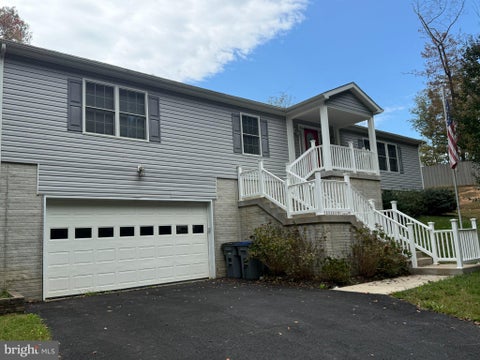 Photo of 7065 Raleigh Tavern Drive, MANASSAS, VA 20112 (MLS # VAPW2132490)