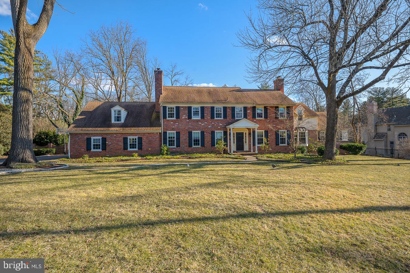 Spectacular, 6 Bedroom, 5 full Bathroom, 1 Powder Room brick Georgian colonial sitting on a level .95 acre lot in sought-after Northside Villanova. This wonderful home has approximately 6000 sq ft plus an enormous basement and a beautiful, in-ground, salt-water, heated swimming pool and spa on a cul-de-sac street. Gourmet open Kitchen has granite countertops and Breakfast Bar, stainless steel appliances, a spacious pantry, a Mud Room and an eat-in Breakfast room with plenty of light. The Family Room has custom built-ins, a gas fireplace, and beautiful hardwood floors throughout. Sizeable formal Dining Room has crown molding, chair rail and wainscoting and connects to a glass-enclosed Sunroom. Traditional Living Room with a wood burning fireplace, crown molding, vast windows and more built-ins. Cozy Office/Den with stone floors, exposed brick walls, crown molding, and wainscoting which leads to a separate bedroom with a cedar closet. Enormous 1st floor Primary Bedroom Suite addition has a gas fireplace, vaulted ceilings, a screened in porch, a dressing room with many closets, an oversized Primary marble bathroom with radiant heat, double marble vanity, jacuzzi and a large custom shower. The 2nd level has 4 Bedrooms with spacious closets and 3 newly renovated Bathrooms. Gigantic walk-out Lower level is finished throughout with a Nanny Suite, 2 Playrooms, a Gym, and plenty of storage. This gorgeous property is located on a beautiful destination street with newer windows, a generator, and a 2-car garage. The grounds have exquisite plantings and landscaping with an abundance of perennial flowers. Award-winning Lower Merion Schools. Close to 76, 476 and all major highways.