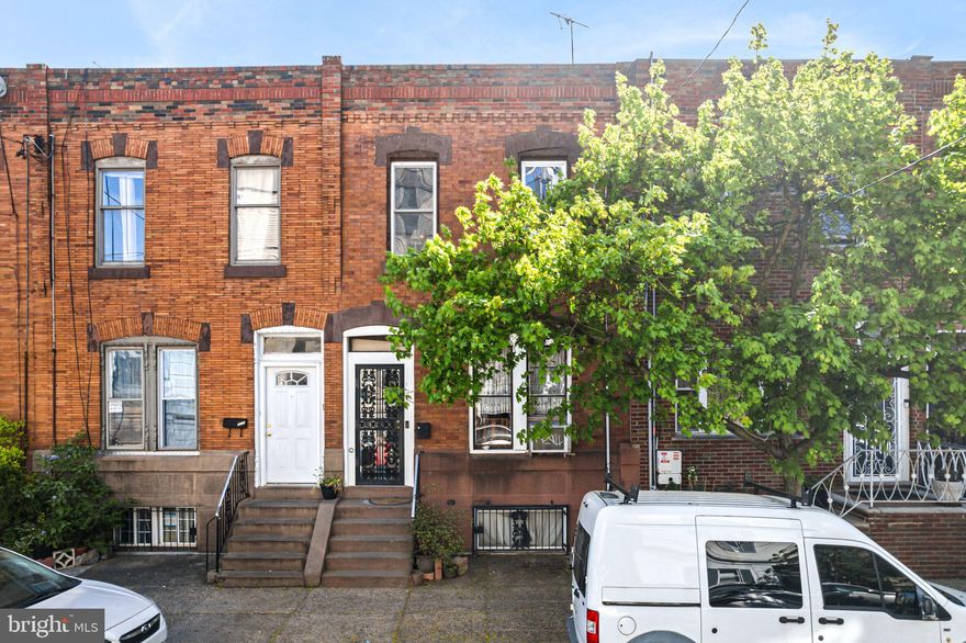 Welcome to 1917 S. 17th St, A RARE and charming 4 bedroom, 1.5 bathroom home nestled on a quiet, tree-lined street just south of Mifflin St. This beautifully maintained, classic Philadelphia rowhome offers the perfect balance of historic character and modern convenience at a price that’s hard to beat in Point Breeze.

Step inside and be welcomed by over 1,400 square feet of sun-drenched living space with an inviting layout that makes this home feel both spacious yet cozy. Inside the vestibule, you'll notice an original and beautifully restored piece of South Philadelphia history—a real mid century modern Tofani door. 

The heart of the home features an updated kitchen with modern appliances—including a dishwasher, disposal, microwave, gas range, and refrigerator—flowing effortlessly into the dining area and living room, ideal for entertaining or cozy nights in. The first floor powder room offers additional convenience. A smartly designed Murphy bed and custom cabinet (included in sale) add flexibility and functionality, perfect for guests or multi-purpose living. Radiant gas heat keeps the home warm and efficient, while ceiling fans and window units provide year-round comfort. 

The back patio is a slice of heaven in our bustling City, where you can grill, host friends or simply enjoy the sunshine. The patio also features a custom Bilco basement door that’s great for storing large items in the basement. 

Upstairs you’ll find four generously sized bedrooms, each with a closet and an abundance of sunlight. The front two bedrooms have a connecting door which is great for a nursery or home office. The full bathroom offers a soaking tub and updated vanity. 

Located in one of Philly’s fastest-growing and most vibrant neighborhoods—home to the South Philly Taproom, Hardena Indonesian, Second District Brewing, Little Susie’s Coffee & Pie, and Rowhouse Grocery to name a few that are all within a 1-2 block radius—and minutes from bustling East Passyunk Ave to the east, Center City to the north, and Home Depot, Shop Rite, Aldi and Sprouts to the south. Does it get any better???
