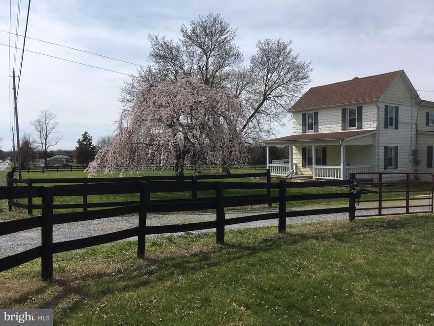 Come check out this farmette that offers fenced pastures with water & electric run to each field. Unrestricted 7.11 acres with 30 X 60 detached garage with LED lighting.  There are two wells and septic, come explore the possibilities.  Farmhouse offers hardwood floors, breakfast nook and much more. Septic to house is for 4 Bedrooms.  New electrical panel installed.