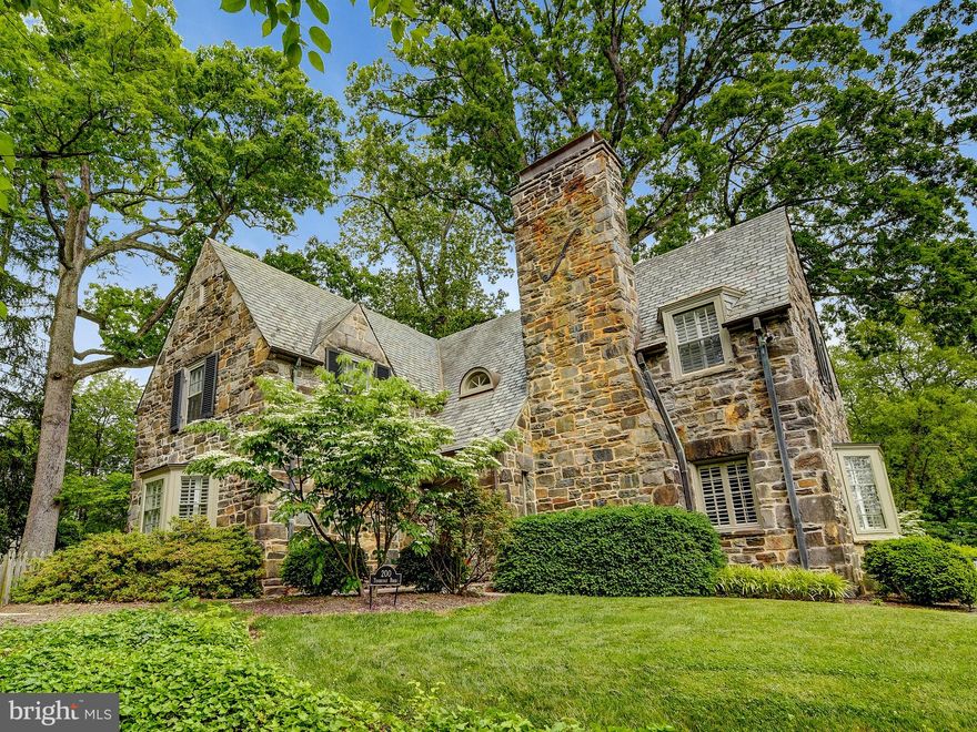 One of a kinds Palmer Lamdin Stone Colonial with Newly Updated Kitchen with High End Stainless Steel Appliances and Custom Cabinetry and Updated Bluestone Patio with Fenced Yard, 4 Bedrooms and 3 Full bathrooms on Second floor, Plus Half Bathroom on Main floor, many original details beautifully preserved with Dual Zone Forced Air AC system, Large Living room with Wood Burning fireplace, Dining Room with period Fixtures and French Doors to Patio, Update Butler Pantry off Kitchen, Den off Kitchen that leads to Patio,   2 Car Detached Stone garage with updated Garage door.   A Beautiful home with many original details and many new updates that maintain the Character, Details and Charm of the original home.