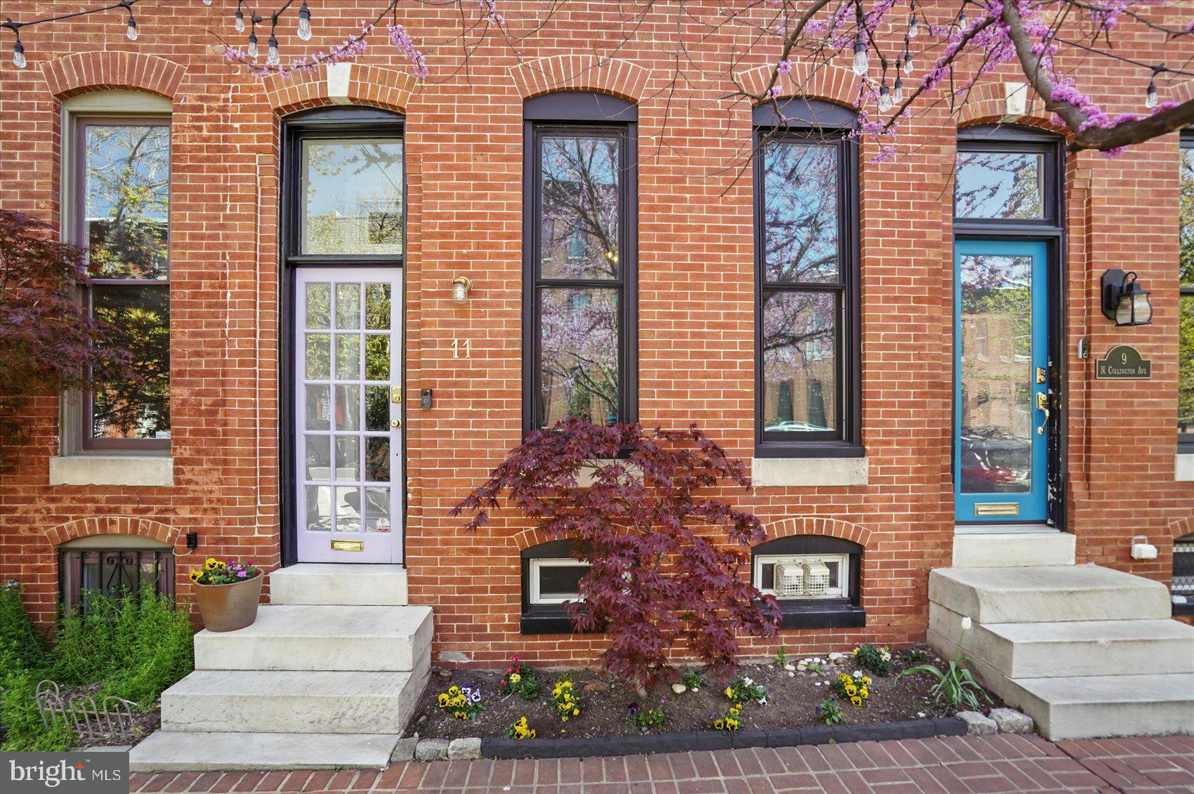 A beautifully updated and character-filled home on a brick-lined street in the heart of Butchers Hill. Enter the living room with its stunning curved wooden staircase and you will immediately be charmed by this fantastic home! The first floor boasts original hardwood floors, two fireplaces, and high ceilings throughout the spacious living and dining rooms. These spaces flow into an updated kitchen, complete with tile floor, loads of cabinets, granite countertops, stainless steel appliances, and a large island with seating. The light-filled kitchen opens to a newly renovated deck overlooking a beautiful private garden. A sanctuary in the middle of the city, the garden features established plantings, brick patio, and a privacy fence.
Ascend the gracious staircase and step into an open, multi-purpose loft bathed in natural light from a large skylight. Envision this space as an office, den, or even a bedroom, as it includes an easily accessible closet. Connecting to the loft are a primary bedroom with a roomy closet, a well-sized guest room with closet, and a shared updated bathroom with a wonderful clawfoot tub.
The finished basement is a highlight of the home with finished multi-purpose space, renovated full bath, and a generous storage room with access to the back yard.
This lovely home is conveniently 1 block from Patterson Park and just a short stroll to Hopkins or the fantastic offerings in Fells Point, Canton, and Harbor East. Reserve your showing today!