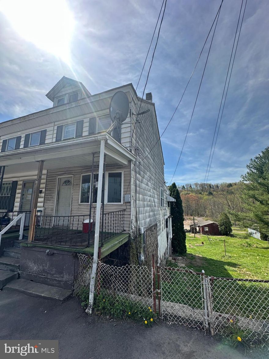 This large twin offers a great investment opportunity.  It is a four bedroom home with two rooms on different levels.  The rear of the property has a large yard with a garage and off street parking.  It is ideally located between Pottsville and Tamaqua.  Schedule your showing today!!
