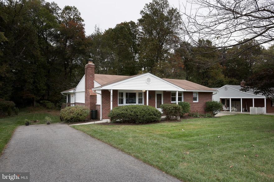 Sharp! Clean! Looking great! Fresh wood floors on main level. Inviting living room w/fireplace. Updated kitchen w/granite counters, SS Appliances. Huge bright and cheery 3 seasons porch! Features 3 bedrooms on main level plus a 4th bedroom on the lower level! Very large L shaped recreation room which walks out to lovely cement patio! Super storage area under sun room! Huge yard backing to trees!