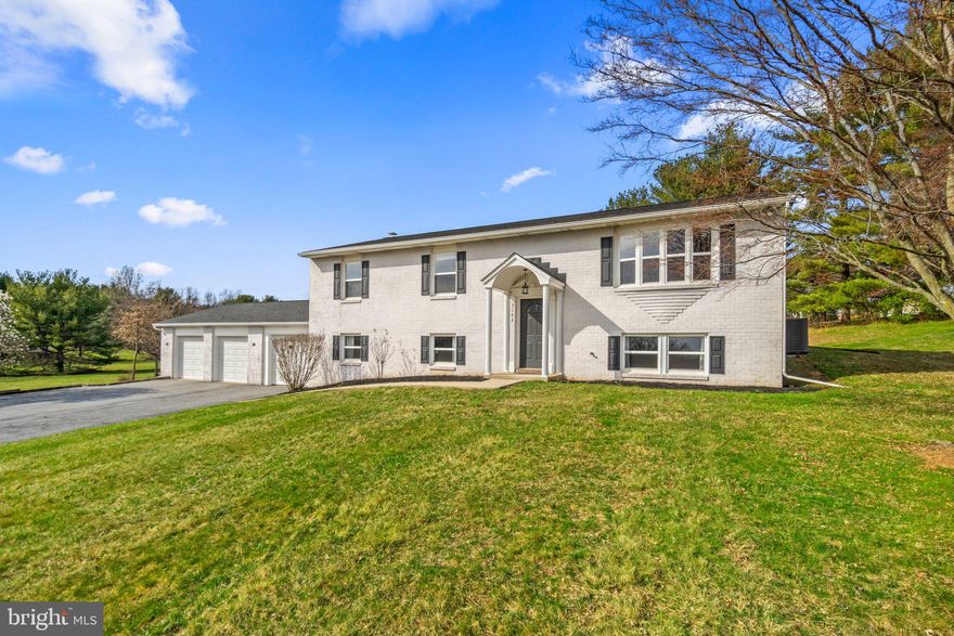 Welcome to this hidden gem, a charming Mount Airy retreat on a tranquil street! This spacious home sits on a sprawling 2-acre lot, providing ample space for outdoor activities and relaxation. Whether you’re hosting lively gatherings or enjoying peaceful evenings, the deck and amazing yard are perfect for entertaining.
Step inside and discover a thoughtfully designed interior. The kitchen is a chef’s dream, featuring rich maple cabinets, elegant granite countertops, and newer stainless steel appliances. Cooking and entertaining become a joy in this well-appointed open space. Gleaming hardwood floors adorn the open main level with a generous family room and adjoining dining room. With four generously sized bedrooms, including a primary suite with an en suite bathroom, there’s room for everyone in the family. Three full baths too!

Recent updates include a newer roof, HVAC system, and windows, ensuring comfort and energy efficiency. The plumbing and electrical systems have also been upgraded, providing peace of mind for years to come. 

The lower level boasts brand-new luxury vinyl plank (LVP) flooring and fresh paint, creating a modern and inviting atmosphere. Incredible rec room or space for gatherings. Walk right out into a huge three car garage!! Perfect for a car enthusiast or extra work space or gym! 

But it’s not just about the house—it’s the location that truly sets this property apart. Top-notch schools are just minutes away! And the best part? You get the tranquility of country living while still being close to all the conveniences you need. Explore local restaurants, tee off at the nearby golf course, shop at major retailers, and enjoy the best of both worlds.

Properties like this are a rare find, so don’t miss out! Come out today and experience the magic of Mount Airy living.