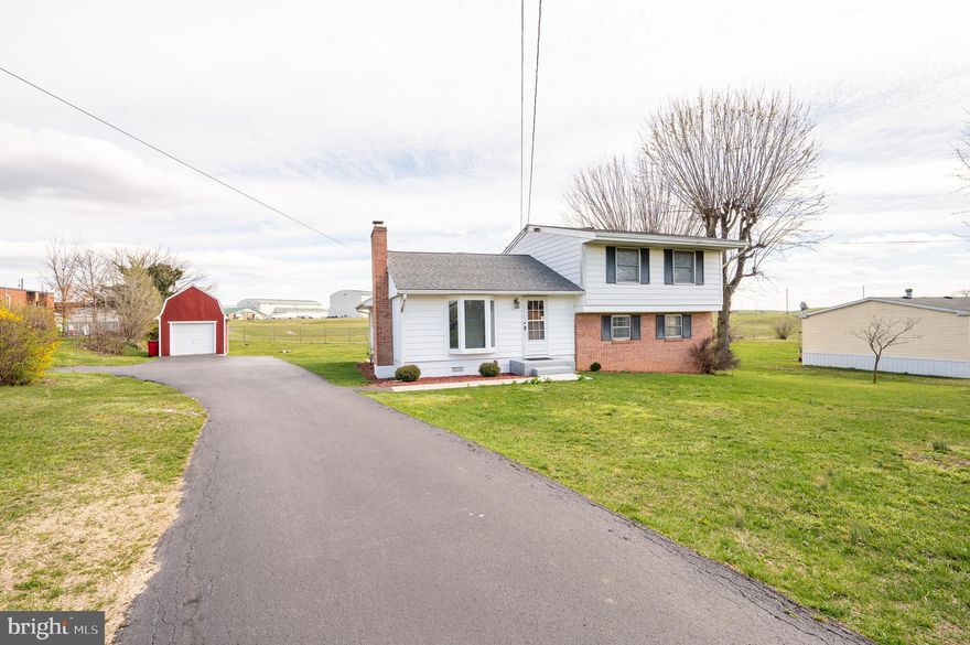 **BACK ON THE MARKET DUE TO NO FAULT OF THE SELLERS**
Welcome home to 3665 Winchester Avenue, an adorable home that is move in ready.  Its location is ideal as it is located between Inwood and Martinsburg with highway access  and all the necessary amenities nearby.  The home offers a long paved driveway which allows for plenty of parking.  The outside patio is perfect for entertaining friends and family.  The large kitchen is great for preparing meals and providing a gathering place to enjoy good food and lots of laughs.  It is equipped with a built in microwave, built in oven and cook top. It also offers plenty of cabinet and counter space as well as a large pantry. On the colder nights cozy up in the living room next to the wood burning fireplace.  Upstairs you will find three bedrooms and a full bath with a heat lamp.  Enjoy the pool table in the basement because it conveys!  A brand new water softener and toilet for the basement also conveys.  Just needs installed.  The detached  garage has plenty of storage above and provides electricity.  The half acre yard is flat.  This charming home is freshly painted and has been well-maintained and is ready for its new owner!