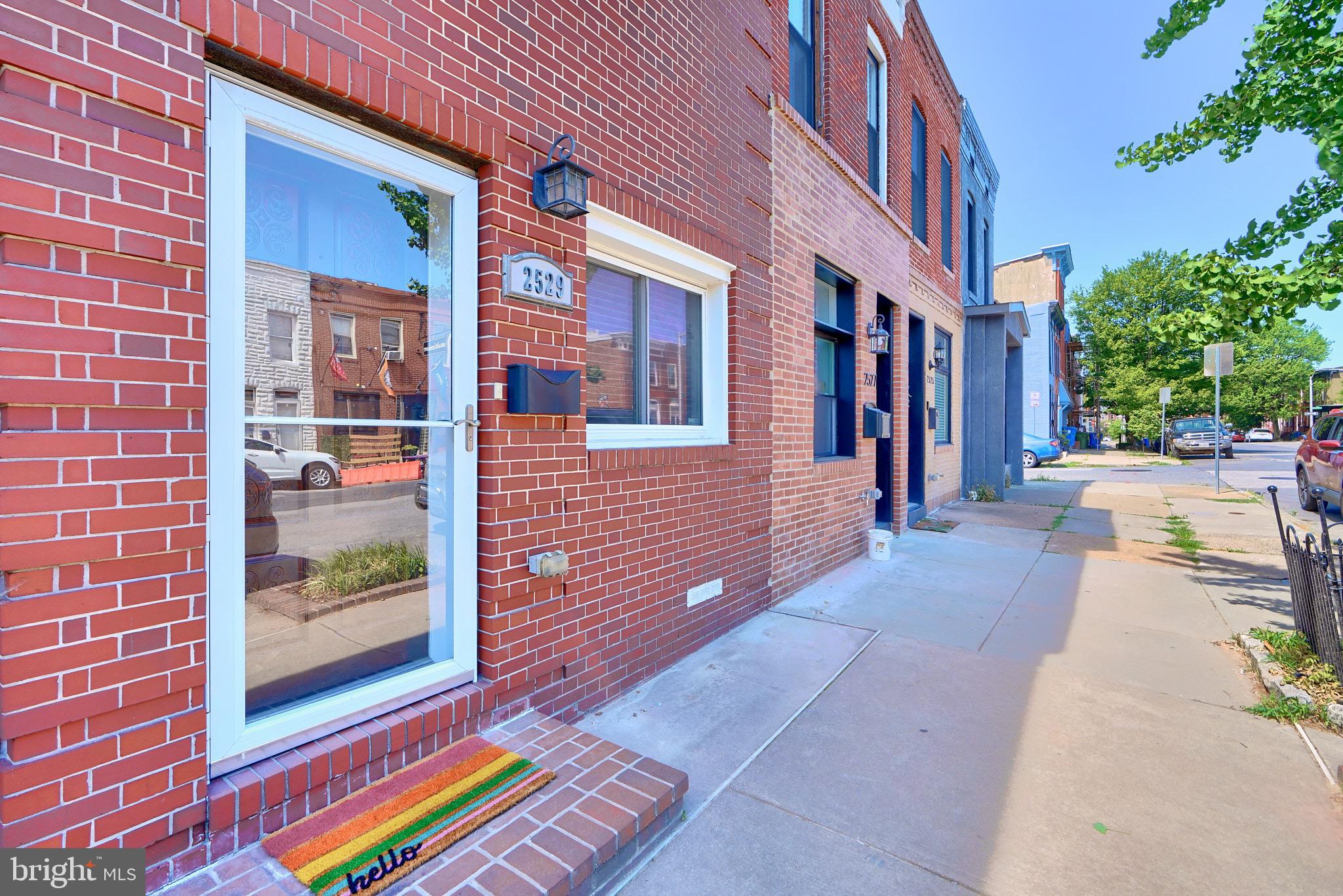 Welcome to 2529 Fait Avenue, an updated 2 bedroom, 1 bath in the heart of Canton. This charming home features high ceilings, exposed beams, an exposed brick wall, and a floating staircase. Upstairs you’ll find both bedrooms, the full bathroom, as well as the washer and dryer. Outside boasts a private patio, perfect for summer entertaining. This home has been freshly painted and has new carpet!
And the location? It’s fantastic. Easily walkable to Canton Square, the waterfront, Fells Point, and Patterson Park. Also convenient to Johns Hopkins and commuter routes. Come check it out for yourself!