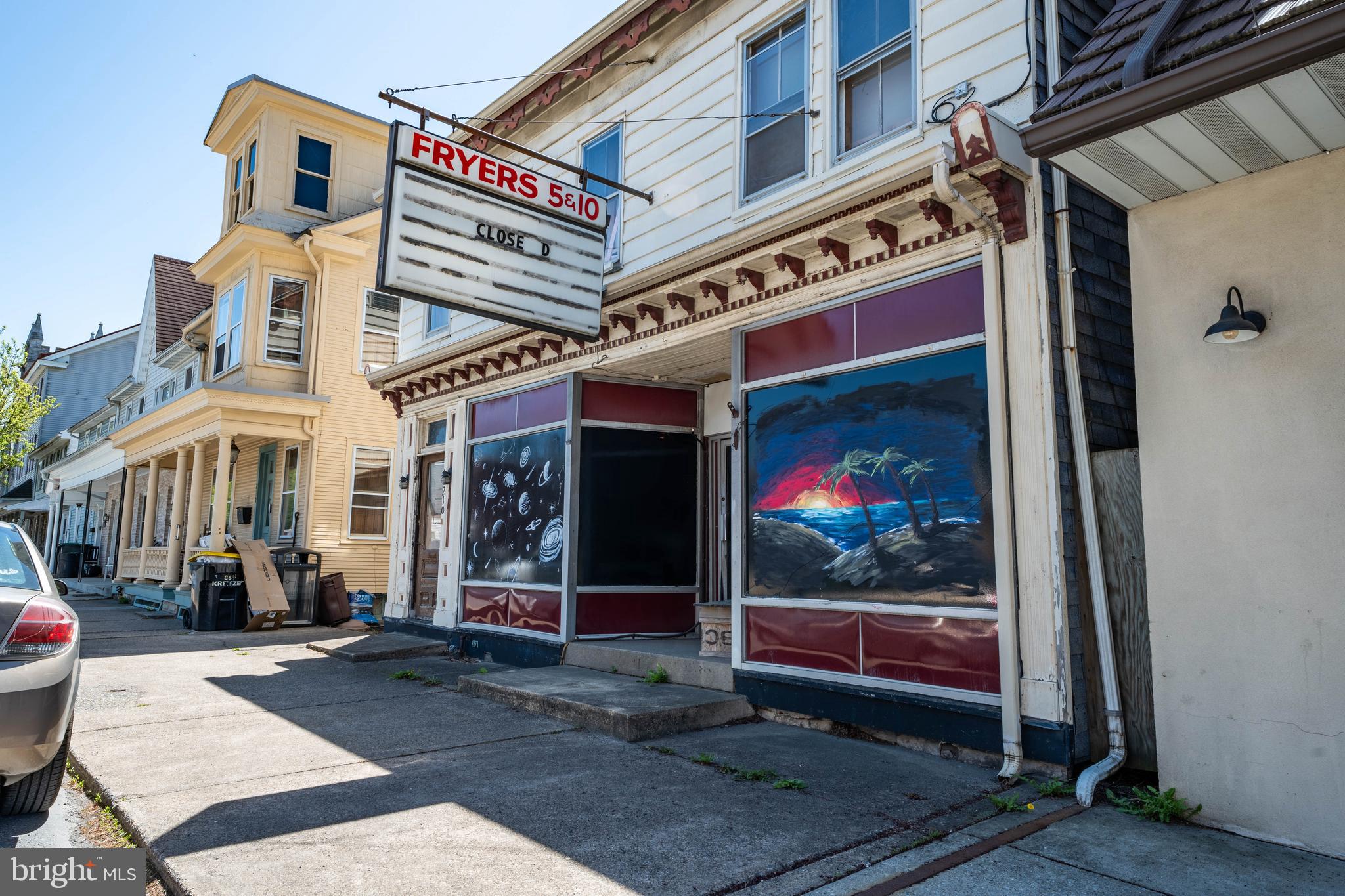 The 1st floor has a hole in the wall and damaged exterior windows that need repair.
Both the front and back wall areas of the 1st floor require attention.