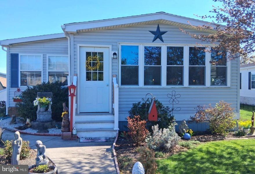 Enjoy easy living in this double wide mobile home that has 3 bedrooms and 2 full baths.   This spacious home has an open floor plan with a lot of natural light.  If you enjoy cooking, the Kitchen has a desirable gas stove and plenty of cabinets for storage.  There is a breakfast nook as well as a dining area just in case you have some company.  The Living Room has a natural gas fireplace with mantle for decorating.  The Primary Bedroom is nicely sized and the large adjoining Primary bathroom has a skylight for extra natural light.  There are 2 more bedrooms and another full bathroom with a traditional tub and shower and another skylight.  You will love the enclosed porch; use it as a large dining room.  as a sitting room or even a gym.  Electric baseboard heat could likely be easily added for additional living space year round.  Sit outside on the outside patio or sit back and relax on your covered front porch and let time pass by.   There is a newer 16x10 outdoor shed with electric to house a lawnmower, gardening tools, bicycles, etc..or it may make a nice workshop/mancave...This home is well taken care of and lightly lived in.  Economical Natural Gas Furnace, stove and fireplace.  

About Shadow Stone Village:  This development is a master-planned Community for adults 55 and older. This vital, active adult Community provides the warm fuzzy feel of a friendly neighborhood, the sweeping beauty of a gem-like, natural setting and easy proximity to the culture and vibrancy of nearby cities such as Hershey, Mount Gretna, Annville and Harrisburg without any big-city hustle or hassles.
  Shadow Stone residents are offered a calendar of activities and have access to an updated fitness center, exercise classes, a large spacious community Center with a chef's kitchen, a library, a social center for family gatherings, and amenities such as barbecues, resident activities, dinners, travel clubs, and monthly restaurant outings. Shadow Stone is a community where you can thrive, enjoy your friends and make new friendships along the way! 
 
We welcome your beloved indoor furry friends as well with no Pet Deposit. And it is a great place to walk, hike, dine and live!
Some activities include:  Yard Sales Twice A Year, Monthly Pot Luck Dinners and an annual Christmas Dinner for the Residents plus much more!
Sale is contingent on Seller finding suitable housing