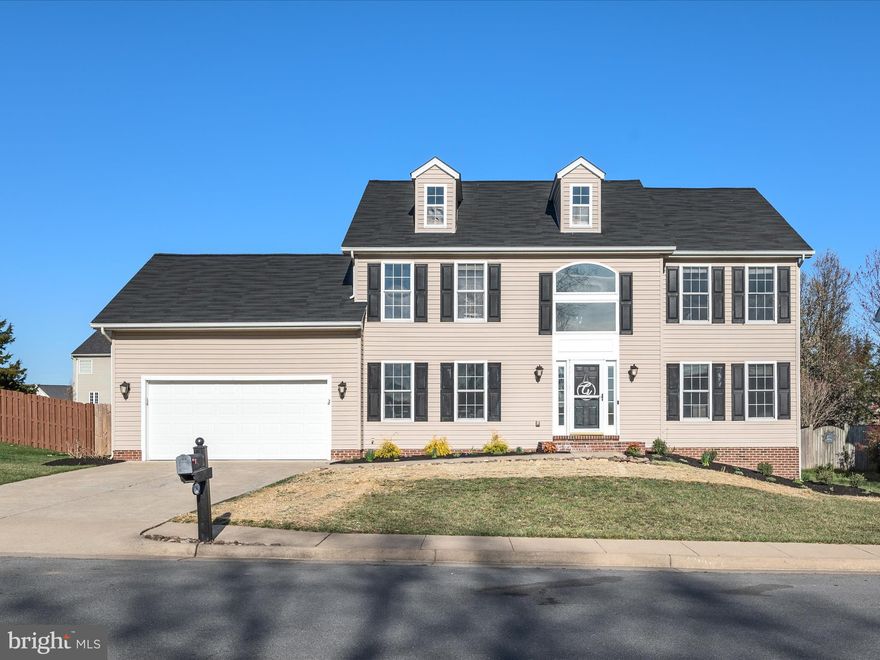 Located in the desirable Canter Estates, this stunning 6-bedroom, 3.5-bathroom colonial offers an inviting blend of elegance and functionality. Step into the grand two-story entryway, setting the tone for the spacious layout. The gourmet kitchen boasts tile floors, granite countertops, stainless steel appliances, a stylish tile backsplash, and a slider leading to the back deck. Hardwood flooring flows throughout the main living areas, including a bright dining room, private office, and a living room with a breathtaking floor-to-ceiling stone fireplace. The open catwalk on the second floor overlooks the living room, with hardwood floors extending through the landing and one bedroom, while the remaining upstairs bedrooms feature plush carpeting. The primary suite is a true retreat with an en-suite bath, soaking tub, separate shower, and tile flooring. A finished basement offers additional living space with both tile and carpeted flooring. Outside, enjoy a beautifully landscaped backyard with a deck, pool, concrete patio, storage shed, and privacy fence. Complete with a 2-car garage, this home is a must-see!