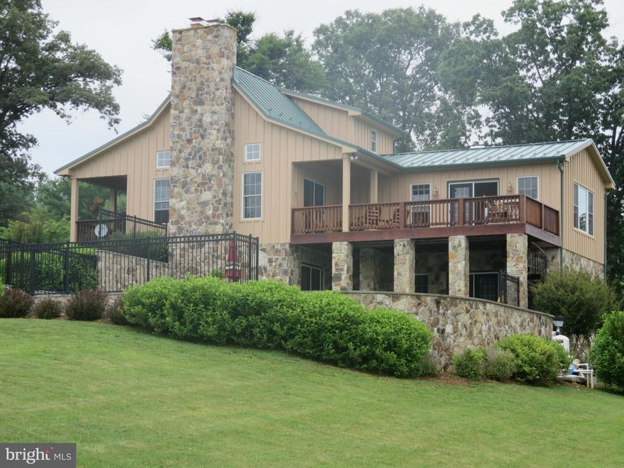 3200sf country home on 49 acres in Hunt Country, constructed of wood & stone w/ metal roof. Upgrades through out. Dream Kitchen, oak wood floors, 3BR/3.5BA, stone FP in LR, Stone patio w/ large in ground pool. Home generator. River & pond views from your front porch and deck. 2 fenced paddocks, kennel, large Barn/equip. shed, with 2 stalls, 3 spaces for vehicles or equip. Shown by appt. only.
