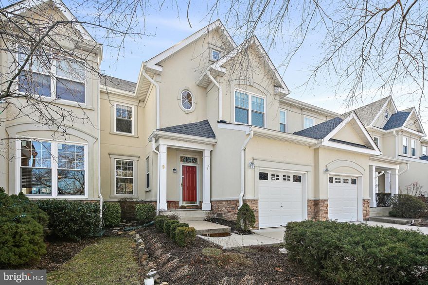 9 Kestrel Lane has an ideal location, facing a park-like area with a walking path, lovely trees, and view of the tennis/pickle ball courts. This spacious townhouse has 3 finished levels, featuring 3 bedrooms and 3 1/2 bathrooms. When you walk in the front door, you are welcomed by luxury vinyl plank that enhances the living room, dining room, kitchen and sun room. The kitchen has granite countertops, stainless steel appliances, and a pantry. A laundry room leads to the 1 car garage with storage shelves and pegboards in place. A powder room is in the entry way. Off the kitchen is a large sunroom, looking out on flowering
bushes and trees. The sunroom leads out to a low maintenance vinyl deck. Upstairs there are 3 bedrooms, highlighted by a primary bedroom with a large walk-in closet and adjacent bathroom with dual vanities, jacuzzi tub, and separate shower.  The other 2 bedrooms have adjacent access to the other full bath on this floor.  As a bonus, down the hall is another walk in closet. Downstairs the finished basement has a large family room with outdoor access, 2 bedroom-size rooms and a full bathroom. In addition, there is a storage room, a utility room, and more storage under the steps.  Some electronics and furniture are available for separate purchase. Updates include luxury vinyl plank (2021), windows replaced (2021), the roof (2017), HVAC replaced (2018), hot water heater (2016), stainless steel appliances (2015), and granite (2015).  Amenities of the community include a beautiful 25 meter in-ground pool, a clubhouse, a gym, and newly resurfaced tennis and pickleball courts (2022).  The community is convenient to shopping and restaurants, as well as to highways.  Don't miss out on this home