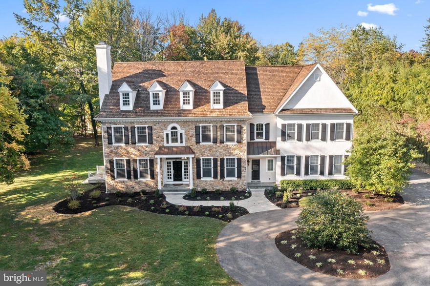 New landscaping is in, new landscaping pictures coming soon! 
Luxurious 5 bedroom, 4 full 2 half bath, stone home with circular driveway in the heart of the most prestigious estate section of Devon. Classic farmhouse designed by Peter Batchelor on 1.3 flat acres. This home features absolutely stunning millwork, wide plank Brazilian cherry floors, front to back foyer, gracious entertaining spaces, large home office/den. Kitchen designed with a chef in mind, large center island - Wolfe & GE Appliances, Bosch dishwasher, 6 burner cooktop, granite countertops, butlers pantry bar area in between kitchen and dining for entertaining ease with wine fridge, fireplace in Living Room, as well as in the large Family Room. Owners Suite complete with en-suite Bath, Sitting Room and large walk in closets. Mudroom with powder room off of the 3 car garage. Expansive unfinished 3rd floor and large unfinished basement with high ceilings and outside access. Award winning Tredyffrin Easttown School District. Conveniently located close to the Devon Horse Show grounds as well as the shops and restaurants in Devon Yards and downtown Wayne.  Easy access to Amtrak to NY via Paoli station, R5 service to Philadelphia from Devon or Strafford stations, close to all major roads, airport & Philadelphia. A true Main Line Dream House!