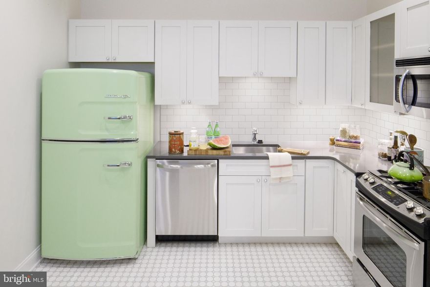 No. 1516 4A: Inviting one bedroom available at the Annex at the Touraine. Both charming and practical, some of the features of this engaging 866 sq ft apartment home are an open kitchen with breakfast bar, full size gas stove, a pop of color in a retro Big Chill fridge, bamboo flooring in the living area, cozy carpeting in the bedroom, in unit washer/dryer, individually controlled heating and cooling, and a complimentary storage space on site.

**Pictures are of a unit with a similar floorplan.  Virtual tour is the actual unit.**

The Annex at the Touraine: Adjacent to the famed Touraine apartment building, sits The Annex at The Touraine, two mid-nineteenth century brownstones which have been lovingly restored with reverence to the original architectural details that have set them apart throughout time. Iconic and unique, each unit has maintained its historic character while incorporating the most modern amenities and environmental sustainability. We invite you to come and see why The Annex at The Touraine is truly history in the remaking.  

Enjoy the coziness of a brownstone and all of the comforts of a Luxury Hi-Rise!  The Annex at the Touraine’s residents enjoy 24 Hour Emergency Maintenance, on-site Management, Package Reception, Online Rent Pay and Service Request Entry through our Resident Portal which can be accessed online or with an app, our Fitness Center & Yoga Studio, Curated Workshops, Hospitality Suites, complimentary and secure document shredding, composting, recycling, Business Center, and more.