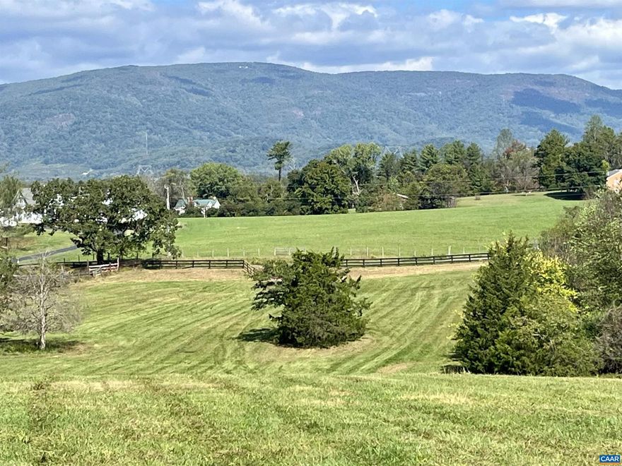 Old Midway Farm is a beautiful property offering many outstanding home sites, each with commanding views of the Blue Ridge and the Ragged Mountain ranges. Conveniently located just west of Crozet with easy access to Interstate 64, Western Albemarle Schools and Crozet. Enjoy the vistas of rolling farmland with mostly open pasture and the balance in mature woodlands on a high ridge above a private meadow with intersecting streams from springs originating on the property. These features attract a wide range of wildlife. Four development rights. Land suitable for horses, cattle or vineyard. Potential pond site.,Old Midway Farm