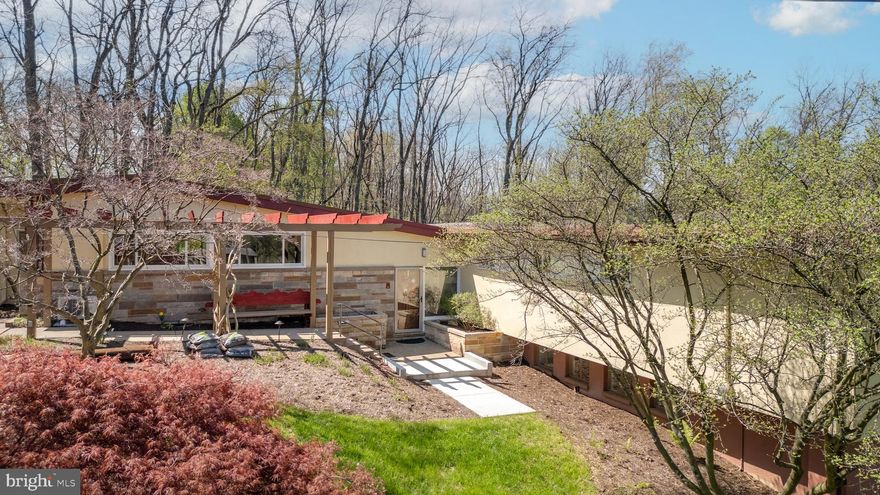 OPEN HOUSE - Sunday, September 28th, 12:00 - 2:00 PM.  Timber Lane is a fantastic opportunity to own a distinctive mid-century house on a private 2.49-acre lot next to Centre Hills Country Club and only a mile from State College's downtown. This grand 5-bedroom, 2 full and 2 half-bathroom home exudes a timeless grace with soaring ceilings and preserved and restored original details, and through the solarium and atrium windows, natural light floods the entire house, including the lower level. Some of this homes' recent improvements include: new carpet & LVT flooring, new mini-splits, some new windows, new concrete septic tank, new garage door openers, a new water heater, electrical upgrades, new smoke & carbon monoxide detectors, new skylight, and so much more!!! Please see the complete list of improvements. The outdoor space is enhanced with a new front walkway, landscaping, a freshly stained deck, a built-in outdoor wood-fired oven, and yard space lined by mature trees. This unique home is just steps away from golf, parks, schools, shopping, and entertainment, plus it’s within walking distance to downtown—a true gem!