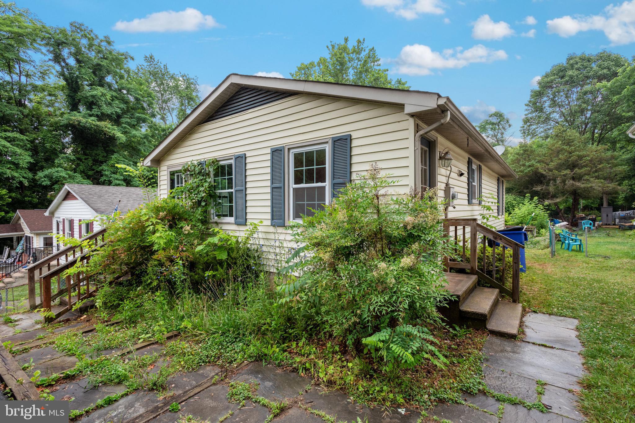 Single Family Home for the price of a Townhome! 3 bedrooms, 2 bathrooms. Spacious main level. Lower level with family room, wood burning stove, office/den, and full bathroom. The back deck walks out to the fenced backyard. Shed for storage. Located minutes from the MARC train, Potomac River, and C&O Canal. Close to downtown Brunswick and schools. Sold As-Is.