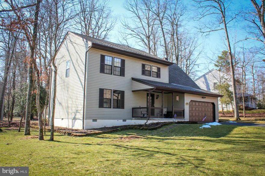 Lovely 4 BR, 2.5 Bath Colonial located on corner lot in Hickory Nut of Wildewood. Beautifully appointed open kitchen with more custom cabinetry then one could imagine. Granite counters and tile floors flow to hardwood in remaining downstairs space. Relax by the fire in the adjoining family room or entertain on the deck, an ideal set-up for entertaining. Home warranty provided. Come visit soon!