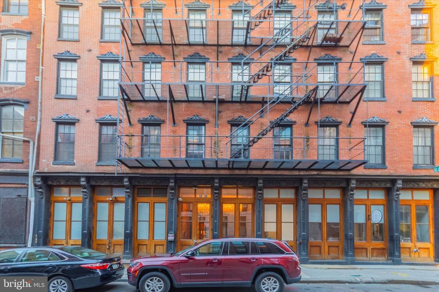 Available for as soon as mid to late May move in or for June: Experience the best of city living in this beautiful Old City condominium. This location is full of historic Philadelphia charm, and this expansive one bedroom offers luxurious, spacious living. Enter into the secure, modern foyer, illuminated by chandeliers, and take the elevator up to your residence. This meticulously maintained loft style unit features all hardwood floors throughout and beautiful exposed brick. Elegant full bath has dual doors to the bedroom suite and the hallway. Excellent closet space with custom built-ins and an in-unit washer and dryer in their own laundry closet which offers additional storage. Chef's kitchen features all stainless steel appliances, ample storage space, and an oversized island featuring an elevated breakfast bar, accented by custom track lighting. Living room is open and easily accommodates large furniture, yet has the cozy comfort of a fireplace and exposed brick wall. Large windows fill the room with natural sunlight from the eastern exposure. Building has a large roof deck featuring lounge furniture and STUNNING skyline and river views, and an on site gym. This unit additionally has its own storage space in the basement, included in the rent! Walk across the street to the nearest subway stop, and access 95 just blocks away for an easy commute. Step outside your door to fantastic restaurants and attractions, such as the Franklin Fountain ice cream shop just up the block!