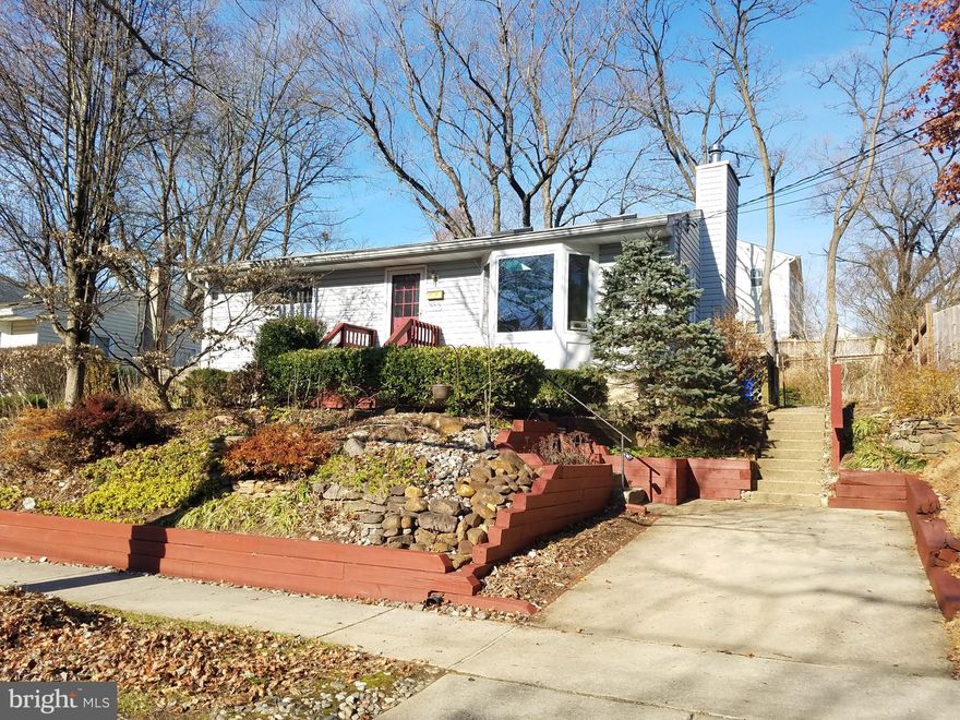 Charming rambler on beautifully landscaped lot in sought after Homewood neighborhood of Kensington.    Sun-filled living room with skylights, hardwood floors throughout main level, large kitchen with french doors leading to deck and gorgeous backyard.  2 Bedroom/1 Full Bath on main level.  Lower level with full bath and walkout to backyard -easy to add extra bedroom, office, or playroom.  Most windows replaced with high efficiency vinyl windows, new hot water heater with expansion tank, wood burning stove.  Near Old Town,  Antique Row shops & restaurants and Rock Creek Park.   Commuters dream:  close to Marc Train, Forest Glen Metro, and Ride-On Bus.