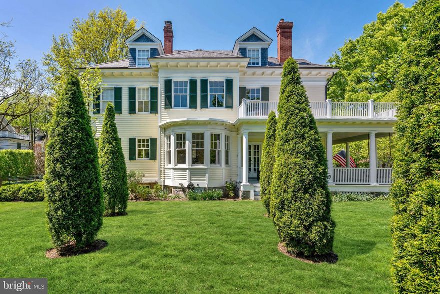 OPEN BY APPT SAT/SUN 5/22 and 5/23 - 2:00 to 4:00.  The home at 10 East Kirke Street is one to fall in love with, to fill with family and friends, to enjoy in all seasons.  With overall square footage of 8800SF and 6550SF of finished square footage, this stately home has large, beautifully proportioned, high-ceilinged common rooms with lovely architectural detailing, plentiful bedrooms, multiple screened and open porches, and landscaped gardens reminiscent of an English country house. Built in 1894, it has been updated for the 21st century in a way that preserves its history and charming singularity. On the first floor is a grand entryway with a living room, dining room and family room radiating off to the sides, as well as a spacious kitchen, butler's pantry and powder room. The second floor has a large master suite with a sitting room plus three additional bedrooms. Three bedrooms and a full bath are on the top floor. There is a picturesque wraparound porch on the front and a detached studio/workshop behind. The home sits on a lushly landscaped, fenced corner lot of almost half an acre.