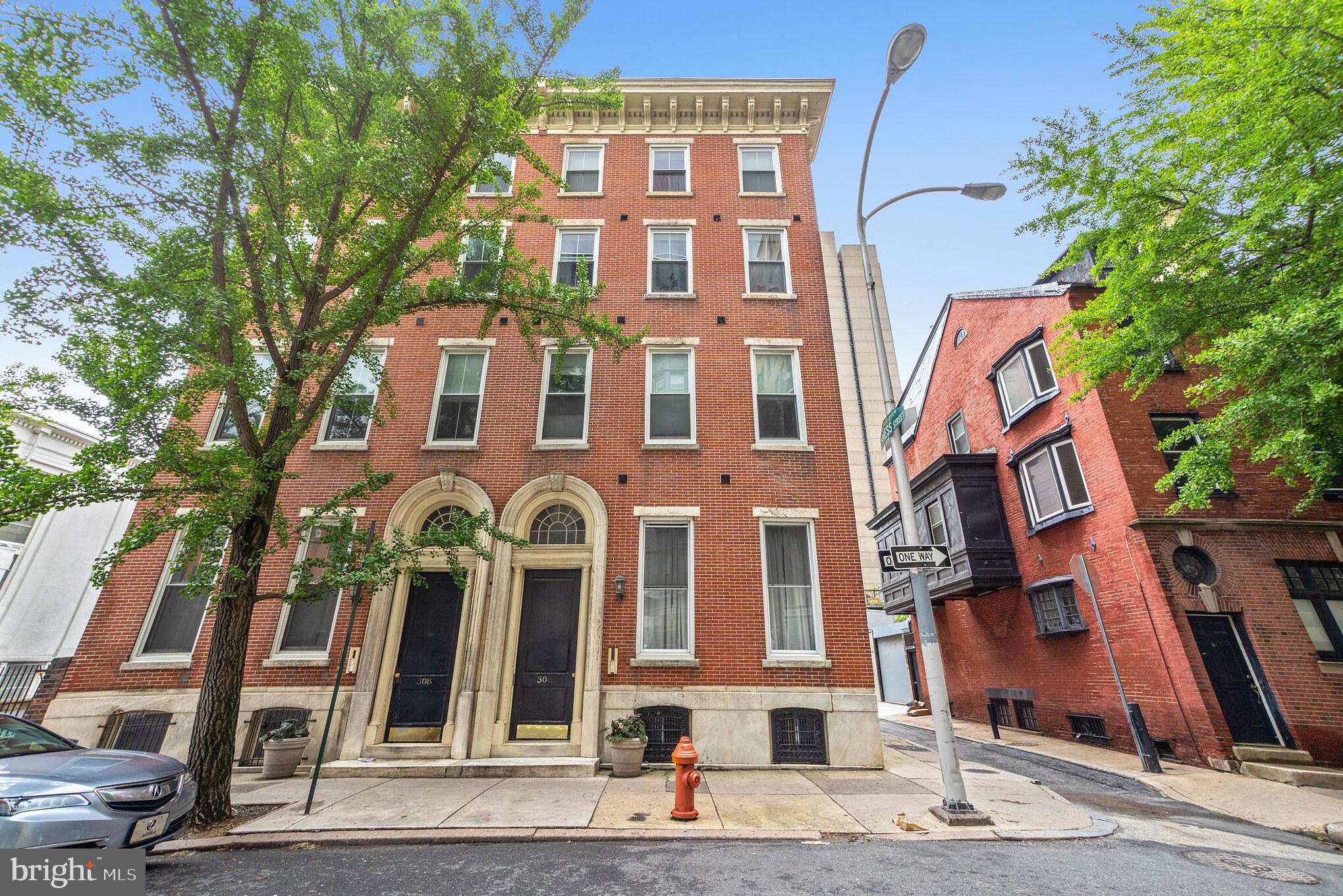 Motivated Sellers, Bring all reasonable Offers. Say hello to modern, convenient city living in this stunningly updated 1 bed, 1 bath home plus deeded parking in Philadelphia s historic and beautiful Washington Square West neighborhood! Enter inside to find gleaming hardwood floors and an abundance of light! A cozy fireplace and a fresh touch of paint make the space feel warm yet airy! The kitchen has been newly upgraded with stainless steel appliances, granite countertops, custom cabinetry, and a convenient breakfast bar. The lower level contains a private bedroom and bathroom, both newly finished with modern updates and finishes, plus ample storage space to include a large master closet. An outdoor patio space is rarely found in the city but offers great additional room for entertaining or enjoying a summer cocktail away from the hustle and bustle of the downtown. Other recent improvements to the home include a new roof installed in early 2020 as well as a new hot water heater! Private parking is a rarity in this area and this home comes with its own deeded parking spot! Just moments away from the city s hottest bars, restaurants, shopping, and clubs, and conveniently located near SEPTA, PATCO, Trader Joe s, Mom s, Whole Foods, CVS, the Kimmel Center, Reading Terminal Market, parks, and more, this home is a must-see today!