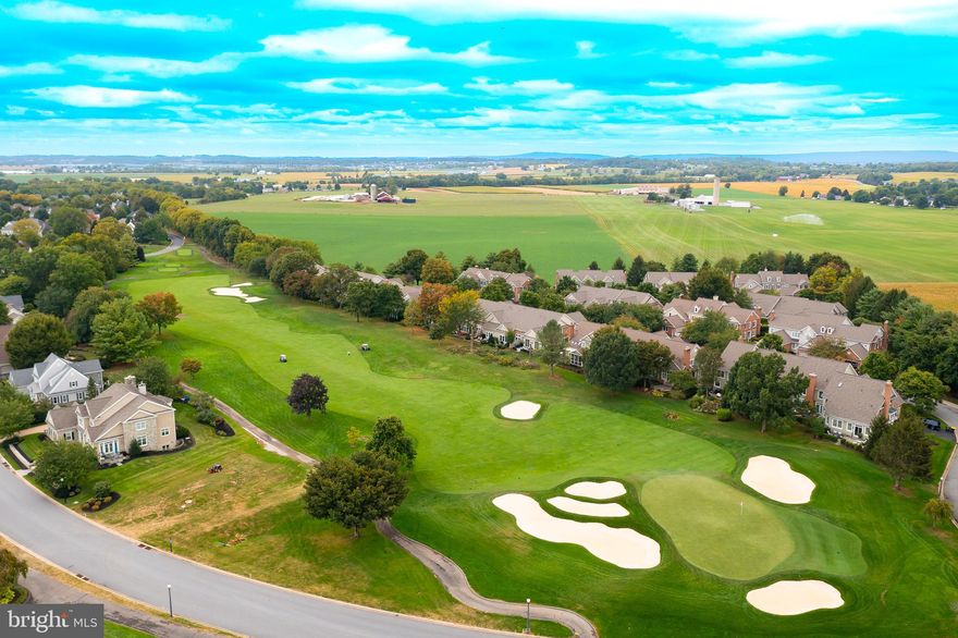 Welcome to this bright southfacing home with plenty of sunshine all day long!  With endless views of Bent Creek Country club's coveted course,  it is uniquely tucked behind a rise between the 1st and 2nd shot providing wonderful privacy on your patio.  Spacious 2 car garage with epoxy floors.  Oversized unfinished basement has plenty of room for storage or to customize to your needs.  The open first floor plan was designed with spacious living in mind.  The primary owner's bedroom is intentionally located on the 2nd floor to expand the first floor living area.   The oversized windows and new glass sliding doors off the kitchen adds light to this beautiful unit.  
Schedule your tour today to enjoy a relaxing life on the links without the excessive yard work and maintenance.
***SEE floor plans at the end of the photos section.
      Tours begin Saturday,  Oct 4th