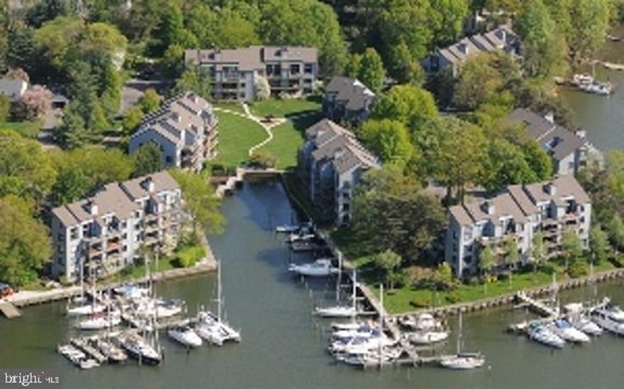 Opportunities like this don't come along often - this is the only residence of its kind in Shearwater, and it offers a lifestyle unmatched in Annapolis. This 2400 + - spacious 4 - bedroom, 4.5 bath waterfront residence is thoughtfully designed all on one level - no steps,  just effortless luxury.  Inside, you'll find two inviting fireplaces, multiple living and entertaining areas, and walls of glass that open to the water. Step outside with sweeping views of Spa Creek where every sunset becomes your backdrop. For boaters, this home includes a deeded 35- foot slip, just steps from your door. Whether its a quiet paddle, a sail on the Bay, or a sunset cruise, your waterfront adventure begins right here. Shearwater is one of Annapolis's most coveted gated communities, known for its privacy, amenities, and easy access to downtown. Here, you can enjoy the best of both worlds- resort-style living in a secure enclave, while being minutes away from restaurants, shops, and the charm of Historic Annapolis.  This condo is two combined with 2 tax numbers 8B1 and 8 A1, Concrete slab and steel construction. Condo fee includes water & sewer, parking, trash, and snow removal.  Enjoy an abundance of nature, blue herons, osprey, and other water fowl. The Shearwater community offers a private, waterfront pool with grill area, pickleball, tennis, racketball, kayak and dinghy rack/storage, a deep water marina and  oyster shell  walking paths - all within a Gated community. Enjoy a nice walk, bike ride or the water taxi will pick you up at  the marina dock and take you downtown. All the fun activities  in Eastport are right at your back yard. The  Eastport Yacht Club parade of lights boat parade in December makes it final turn right in front of the Shearwater community. Rare opportunity to combine single level living, waterfront access, and the timeless Annapolis Lifestyle.