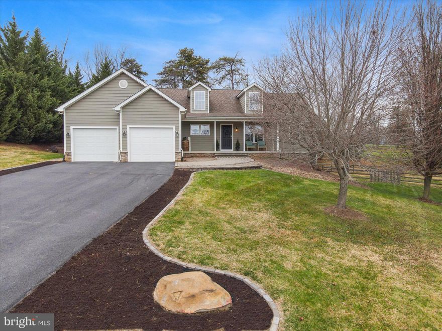 Great price! - Move in ready!  Why wait for new construction!! This beautifully renovated and meticulously maintained property with a range of modern amenities and high-quality features is ready to be your next home. The home is situated on the 10th fairway of the Mountain View Golf Course in The Woods Resort. There are stunning views of the mountains and a pond on fairways 8 and 9. The low maintenance exterior with Hardiplank siding and stone accents on the foundation is timeless. Once inside you find main level living that is designed for convenience with style. This custom-built home has unique architectural details with vaulted ceilings and dormers, custom oak hardwood floors in the living room, kitchen, entry foyer, dining room, and hallways. There are custom lined window treatments throughout the home. Entering into a kitchen you want to cook in with beautiful cherry cabinets, granite countertops, vaulted ceilings, under-cabinet lighting, and new stainless-steel appliances as well as an updated sink and faucet. A custom gas fireplace in the spacious living room with a wood mantle and granite detail. There is a set of french doors for access to the back deck.  On the backside of the living room you find a spacious open dining area that has a 2nd set of french doors going into a large screened in porch with direct access to the large open deck. Making your way down to the fenced-in rear yard with an attractive stone retainer wall there is plenty of room for a swing, yard games and so much more. Back inside on the main level you have 3 bedrooms and 2 renovated bathrooms. All the bedrooms have new carpet and custom blackout blinds. Off the main hall you find the separate laundry/mud room with a side-by-side washer/dryer, laundry sink and pantry cabinet. The laundry/mud room  exits into the large attached 2-car garage.  On the other end of the main level you find the spacious owners suite with large walk in closet and attached full bath - again, completely renovated to be the spa retreat you are dreaming of! Downstairs you find the finished walkout basement that offers a large flex space ideal for a media room, exercise or game room- so many options. A bar hookup exist for future updates!  There is a 2nd gas fireplace on the lower level. The basement also has 2 of the 5 bedrooms, a full renovated bathroom and 2 unfinished storage areas. 
The home has an upgraded HVAC system with a recent duct cleaning.
This home offers a perfect blend of modern upgrades, comfort, and a picturesque location. The attention to detail and the various amenities makes it a standout property. Comcast is available!