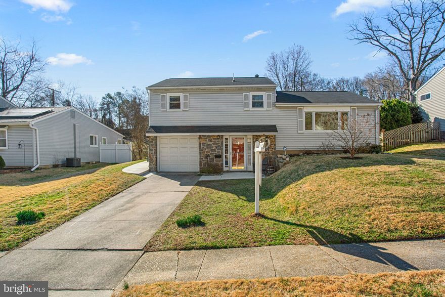 Welcome to 1115 Meadowlark Dr. This home is nestled in the center of the desirable Wynnewood Community and features 3 bedrooms (plus an office or 4th bedroom) and 1.5 bathrooms. This lovely split level home has 1,344 square feet of living space and includes features such as hardwood flooring, a large bay window and attached one car garage.  The front door opens up to a foyer with easy access to the garage, a half bath and the office/workout room/4th bedroom. The main level is the heart of the home where you will find the kitchen, a dedicated dining room and the large living room with plenty of light. The third floor is where the three bedrooms and updated full bathroom are located. The large backyard with a patio is perfect for relaxing, gardening or hosting gatherings. 
This home is truly move in ready and several updates include windows (2023), bathroom, air conditioning unit, hot water heater, kitchen appliances, garbage disposal (2021) as well as new interior doors, concrete patio & storm drainage in backyard. Move in just in time for a summer of fun at Wynnewood Pool, which is located just at the bottom of the street. This house is conveniently located with easy access to 95, 695, UMBC, BWI Airport, Guinness Brewery and Patapsco State Park. Come take a look today....its a great home and ready for the next chapter!