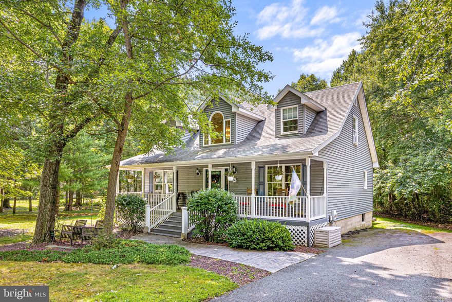 Fall in love with the privacy and beautiful setting of this three bedroom, two bathroom home. With three finished levels, there is plenty of living space. Enter the home from the large covered front porch. Perfect for spending time outdoors on warm summer evenings. On the first level you will find the first of the bedrooms, adjacent to a full bathroom for your convenience. On the back of the home there is a lovely sunroom with vaulted ceilings and skylights that is open to the kitchen and large family with with a gas fireplace. Upstairs there are two nicely sized bedrooms with a jack and jill bathroom that also has a skylight! The lower level boasts an additional family room/game room as well as a bonus finished space and a storage room. Outback there is a large deck for entertaining and a private back yard with a storage shed. Don't wait to schedule your showing for this beautiful home!