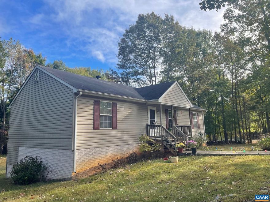 **Significant Price Improvement ** Charming 3-Bedroom Home on Nearly an Acre.  Situated at the end of a peaceful cul-de-sac, this 3-bedroom, 2.5-bath home rests on a .94-acre lot.  The main level offers a bright living and dining area with vaulted ceilings, creating an inviting and open atmosphere. The basement includes a kitchen with a bar sitting area, stove, refrigerator, and utility sink, along with a half bath that needs to be finished.  Some sheet rock has already been installed, giving you a head start on completing the space-ideal for a recreation area, or extended living. The property offers comfort, functionality, and the opportunity to add your own finishing touches.  Bring your TLC to make this your next home!  Stay connected with high-speed Firefly internet, making work, streaming, or gaming a breeze. Home being SOLD as-is.,Formica Counter,Oak Cabinets,Fireplace in Living Room