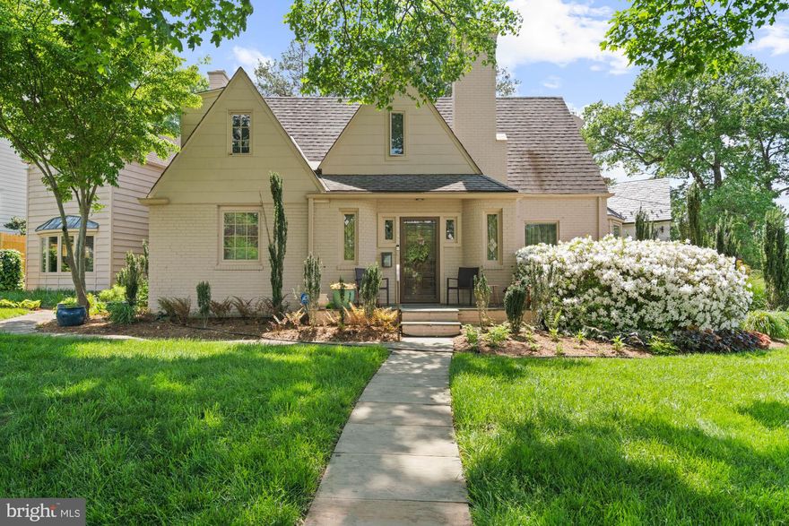 Like a full-scale model of a favorite storybook cottage, this handsome Westbrook Neighborhood home charms the moment you arrive, standing proudly and peacefully, wrapped in gardens and anchored by warmth. Expanded with an artist’s eye and a craftsman’s precision, a seamless addition creates a main-floor bedroom suite, family room, and more bedrooms upstairs, expanding the original footprint without losing a drop of character.

The warm entry foyer includes diamond-pane casement windows that evoke classic artistry, and chestnut millwork with a deep, welcoming patina that feels both elegant and earthy. The living room is expansive and gracious, centered on a wood-burning fireplace and a bay window that welcomes in soft light and leafy views. The kitchen spans the back of the home, big enough for a table, and easy access to the patios and garden.

With a playful spirit, the kitchen features stainless steel appliances, warm wood cabinets, an art-inspired backsplash that shows the space is ready for pancakes, pizza nights, or a pot of tea. The main level includes a formal dining room, the oversized family room with built-ins and access to the patio. The thoughtful addition of a beautifully updated bedroom with en suite bath means its truly a home for all ages: main-floor bedroom, home office, or formal den.

Upstairs, the allure continues with a second primary en suite bedroom, two additional bedrooms, a finished dormer office nook, a playroom, and another full bath.

And the lower level? Surprises in the best way – a spacious rec room with fireplace, laundry area, and ample storage. There's also a flexible bonus space that was previously used as a guest room with rough-ins for a full bath still in place and ready for easy restoration.

5142 Worthington Drive is a quiet choreography of structure and setting. Not one inch of is wasted as it’s positioned with care, blending into the landscape with patios and a deck, along with a welcoming expanse of grassy lawn. It’s a rare blend of character and practicality, grace and function.

Located in the heart of Westgate -- a neighborhood celebrated for its tree-lined calm and city-right convenience -- this home offers more than just a place to live. Enjoy walkability to favorites like Millie’s, Bluestone Lane, Wagshal’s, and Compass Coffee, with Crate & Barrel and Whole Foods just a mile away. Beloved for its Fourth of July and Halloween parades, Westgate (or “Westbrook Neighborhood,” as some call it) feeds into Westbrook Elementary, Westland Middle, and B-CC High. It’s also in-bounds for Little Falls Swimming Club. With easy access to Metro, downtown Bethesda, Tenleytown, and Friendship Heights, this is suburban living with an urban pulse.